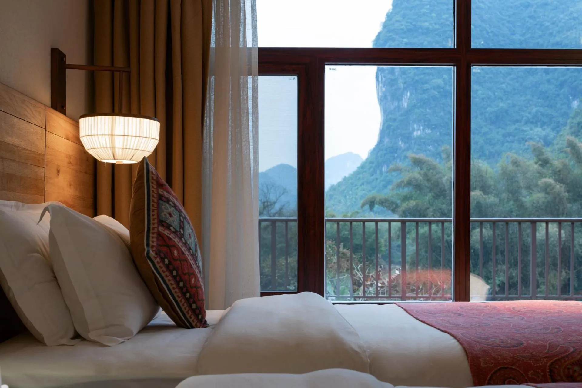 Bed in Yangshuo The Apsara Lodge