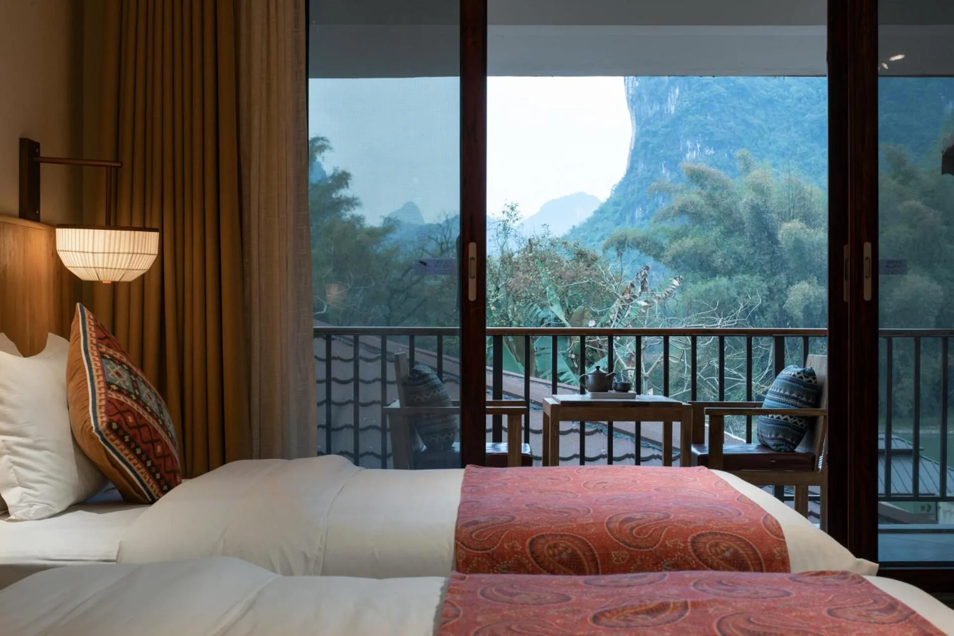 Bed in Yangshuo The Apsara Lodge