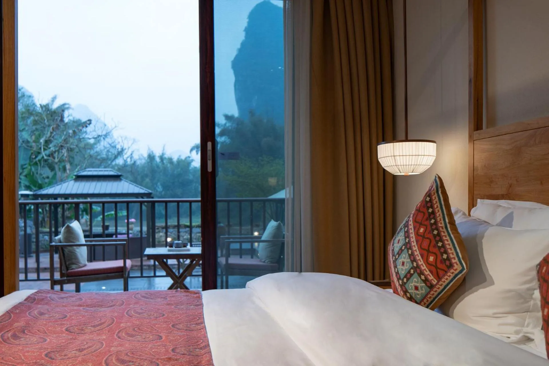 Bed in Yangshuo The Apsara Lodge