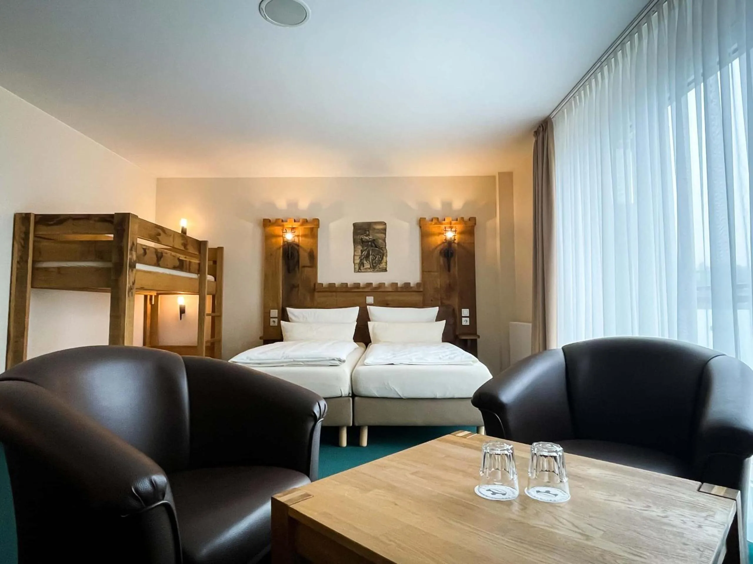 Photo of the whole room, Bed in Hasseröder Burghotel