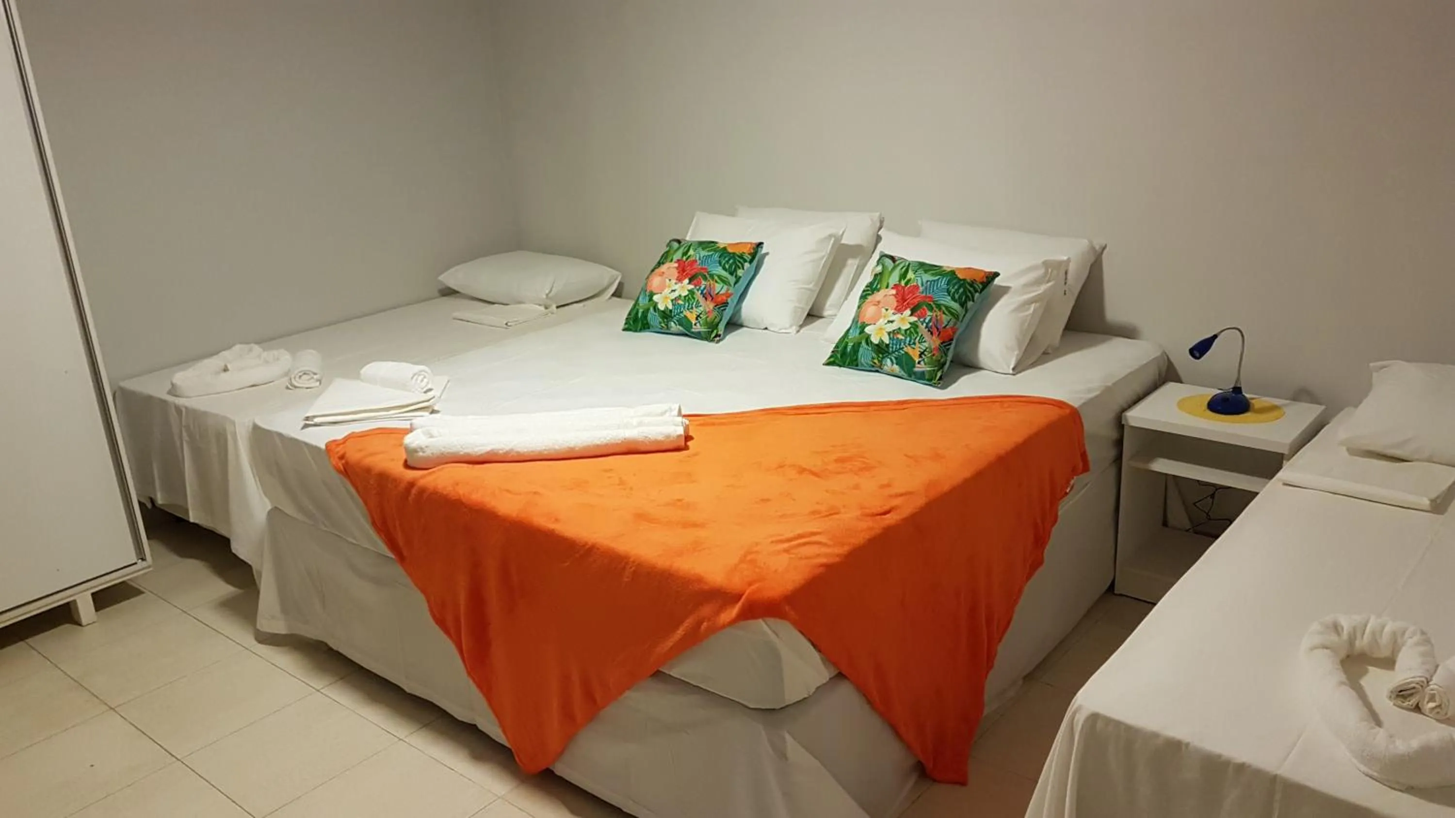 Bed in Pousada das Bromélias