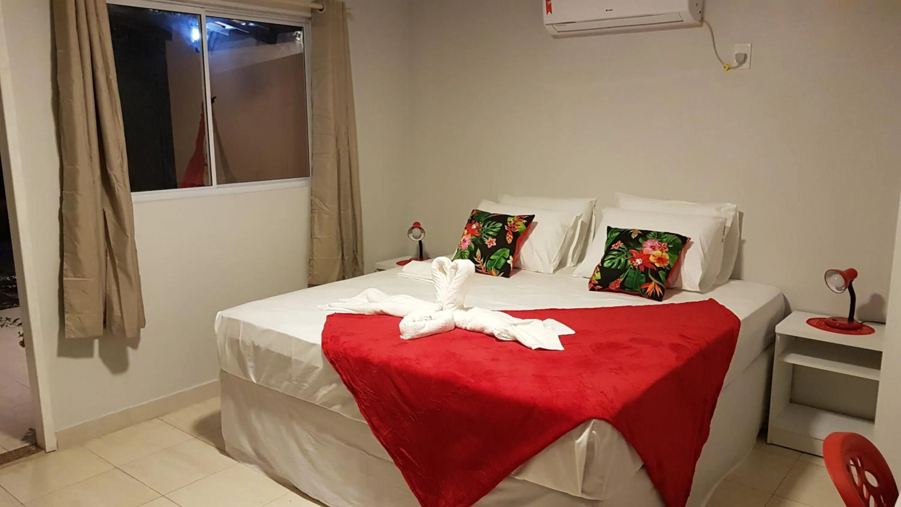 Bed in Pousada das Bromélias