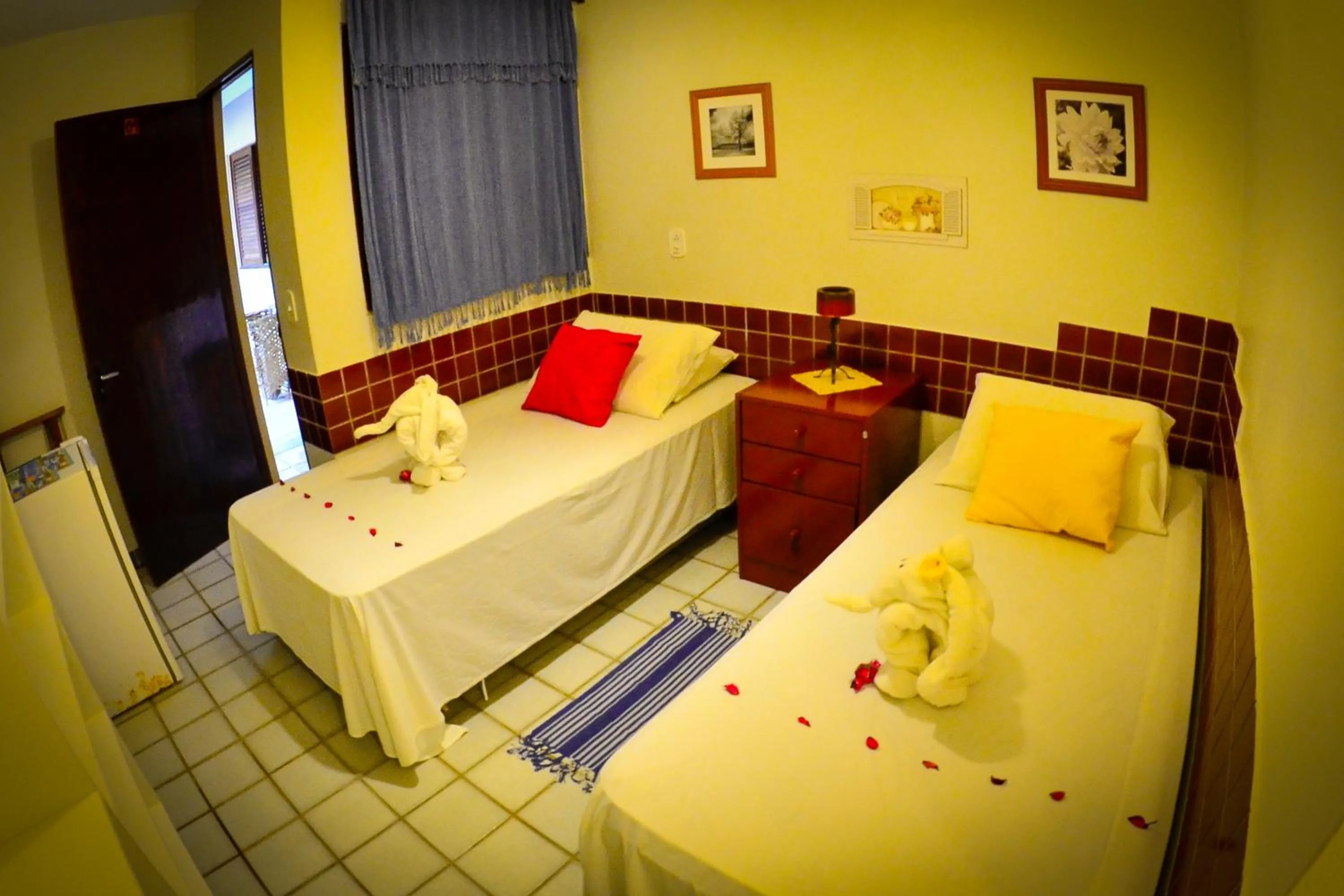 Bed in Pousada das Bromélias