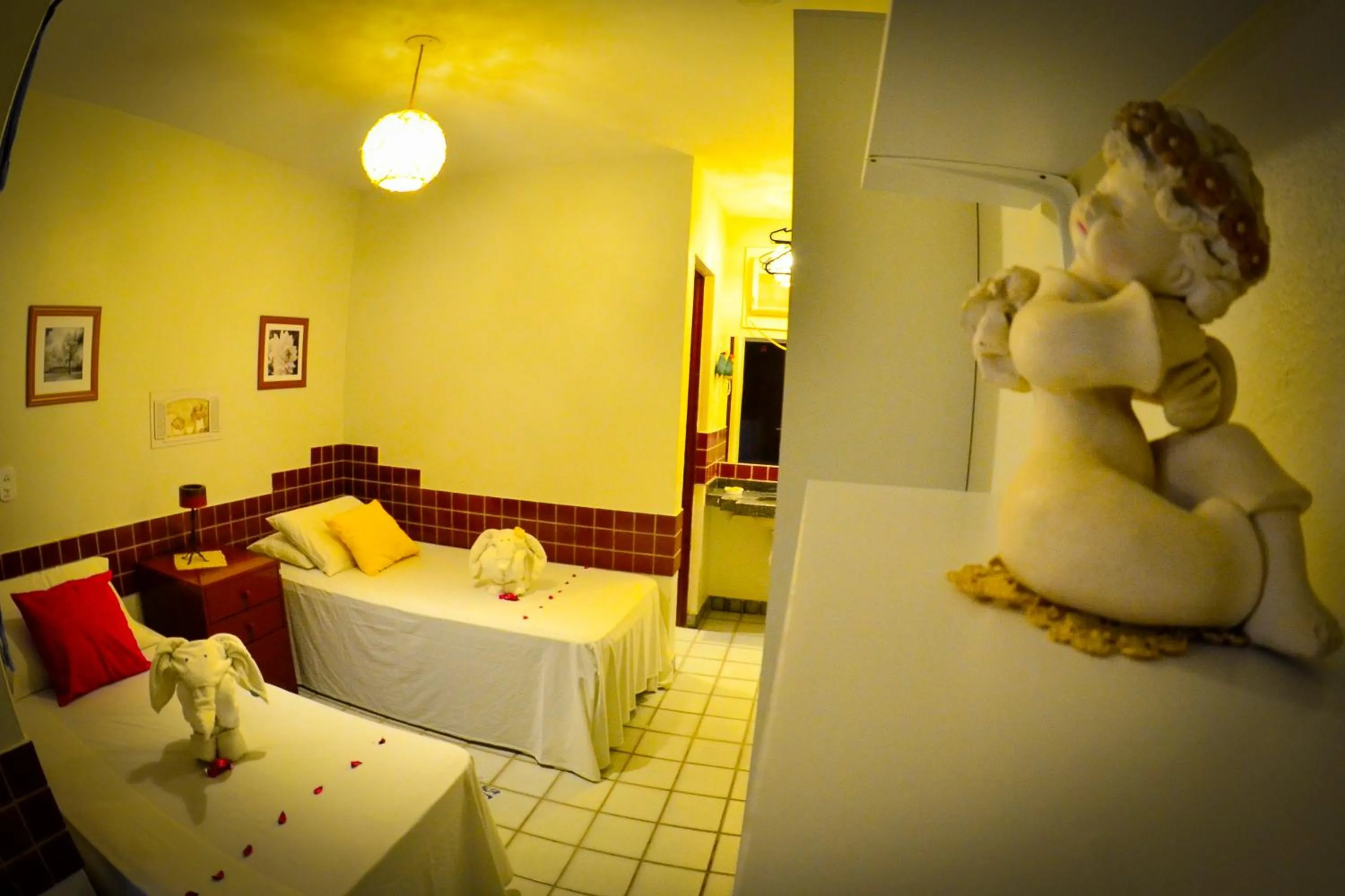 Bed in Pousada das Bromélias