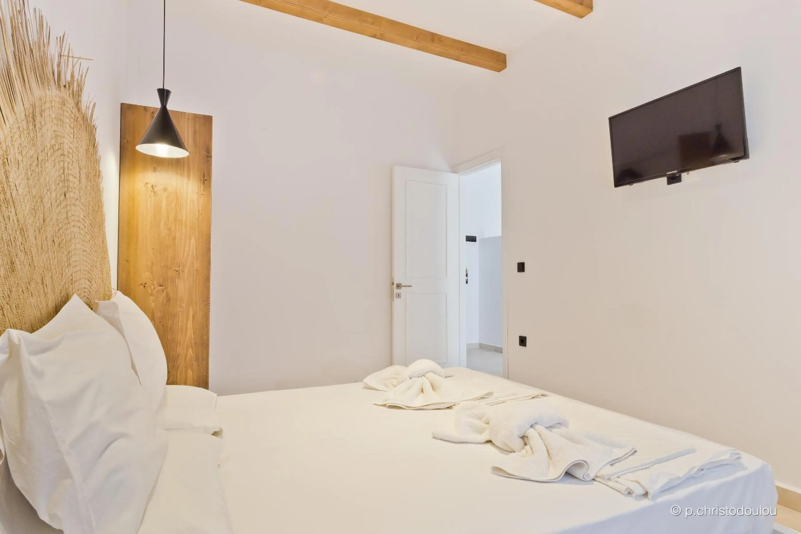 Bed in Kyra Panagia Hotel