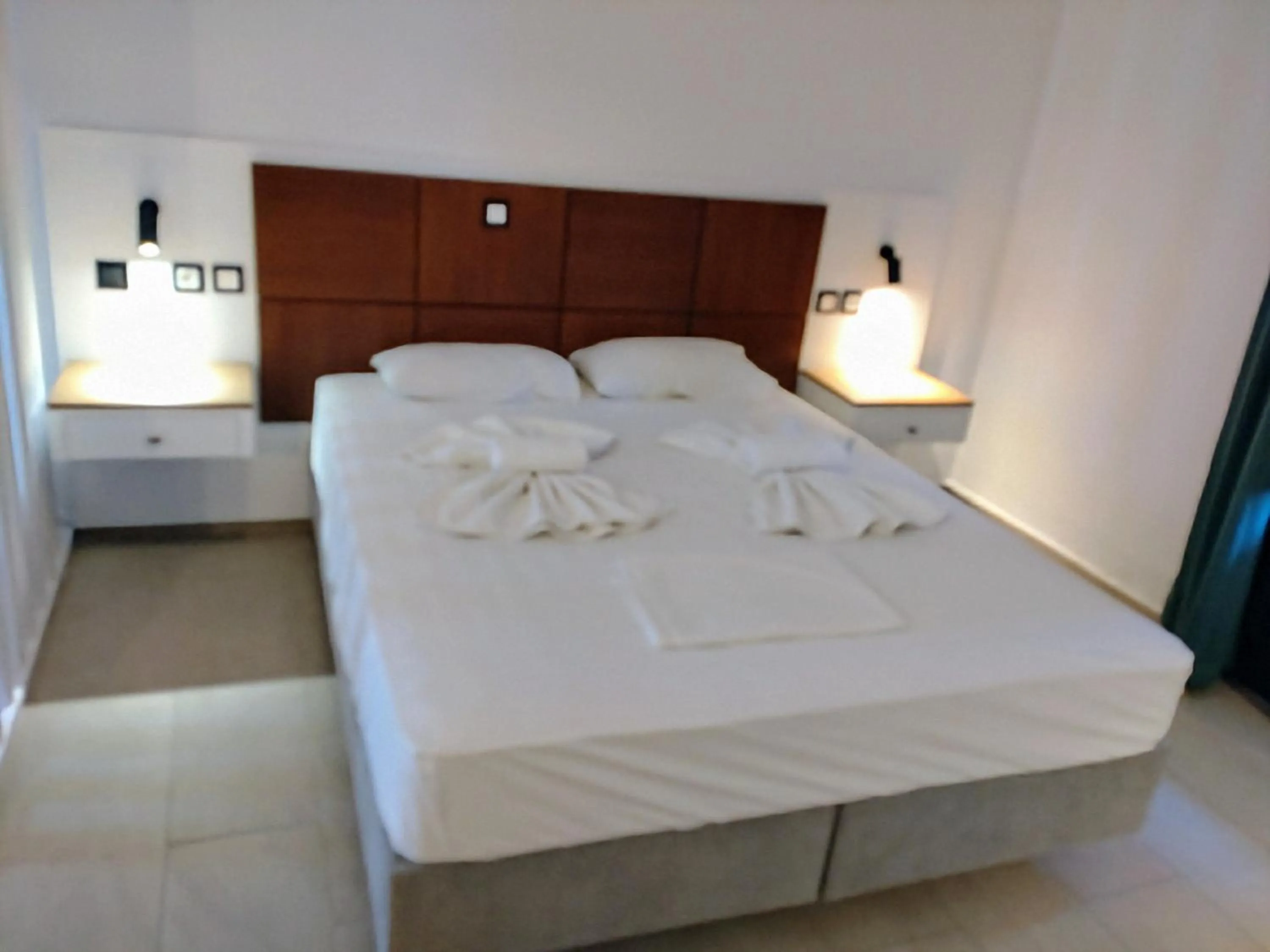 Bed in Kyra Panagia Hotel