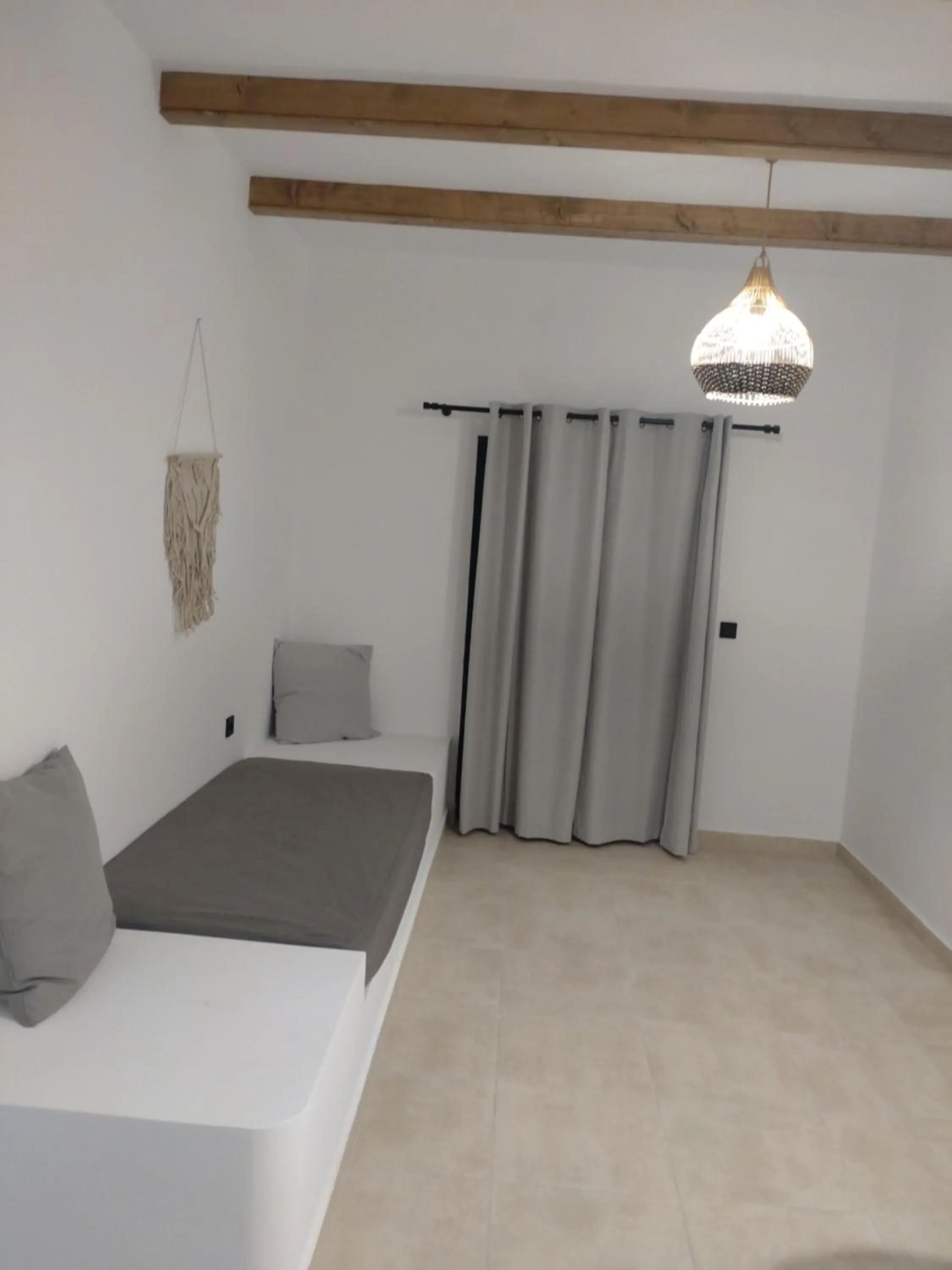 Bed in Kyra Panagia Hotel