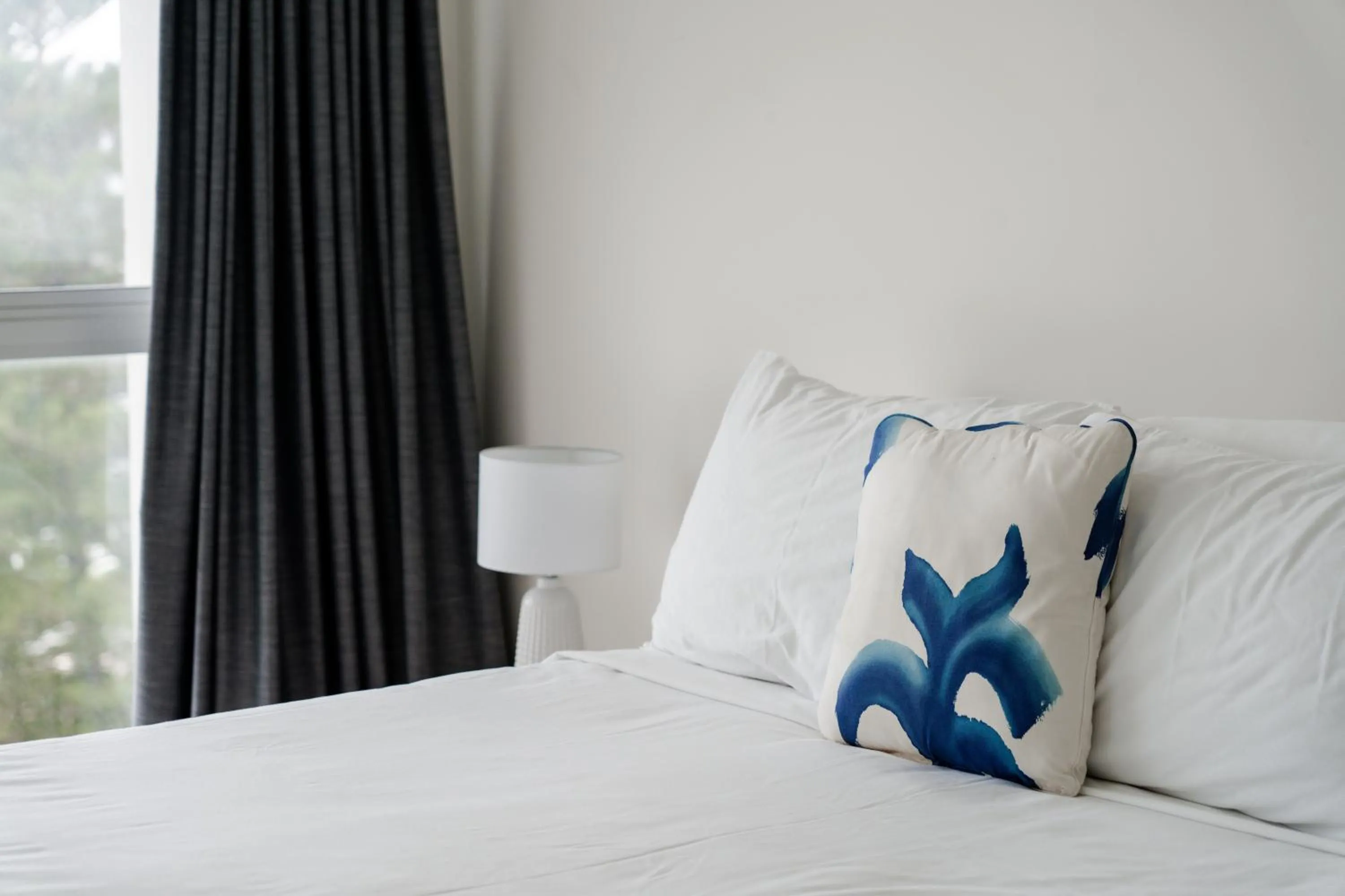 Bed in Cashelmara Beachfront Apartments