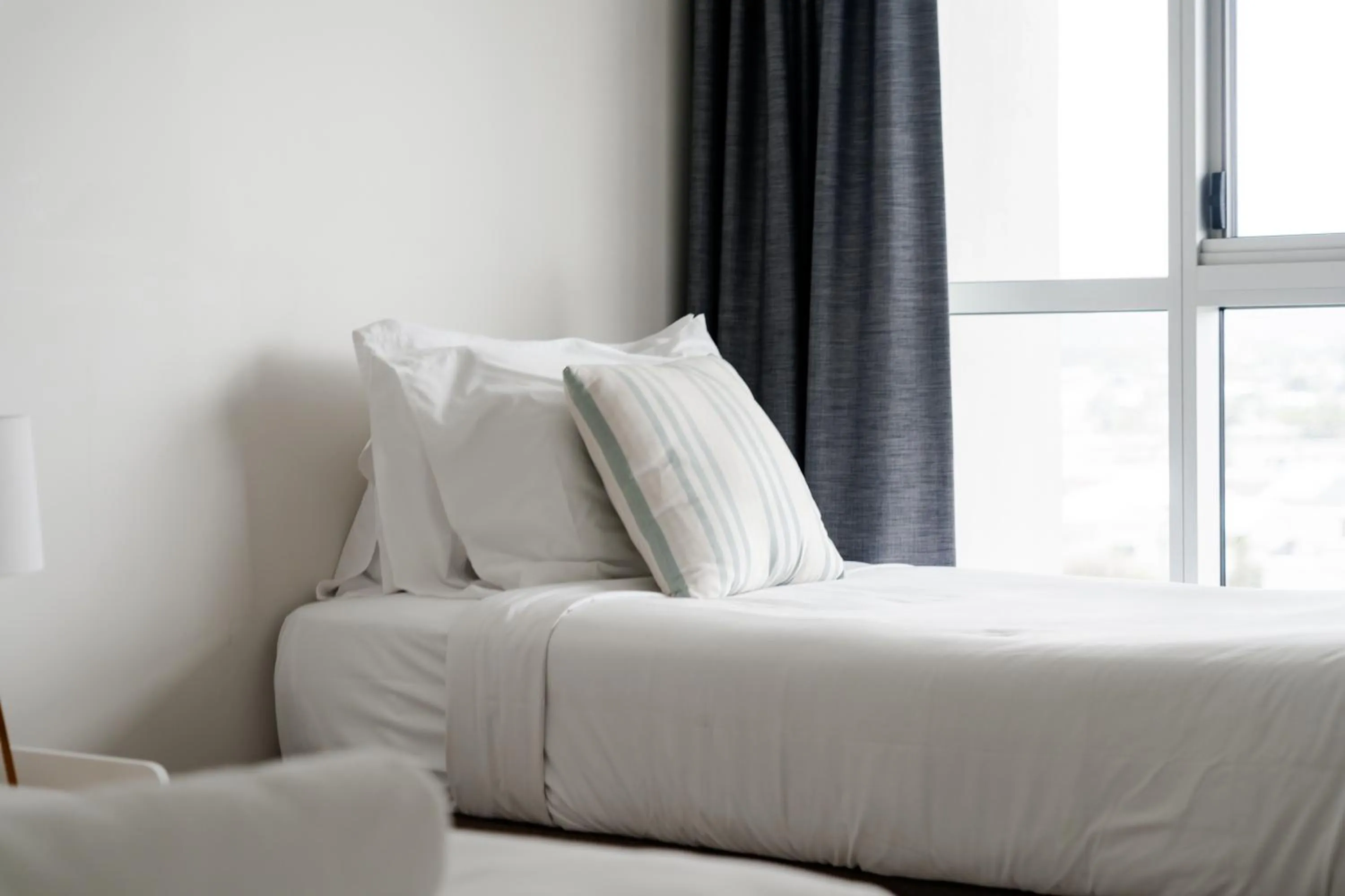 Bed in Cashelmara Beachfront Apartments