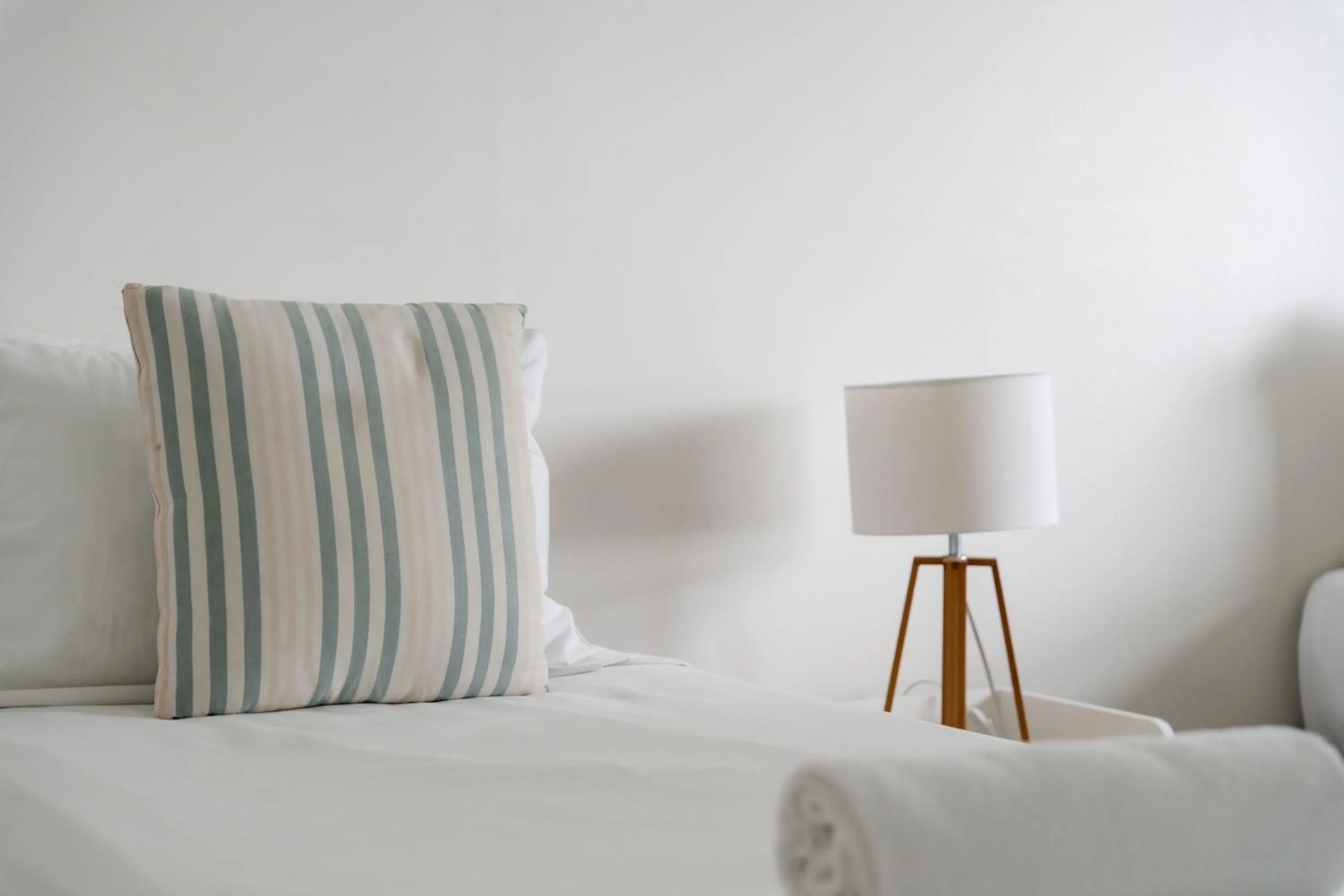 Bed in Cashelmara Beachfront Apartments