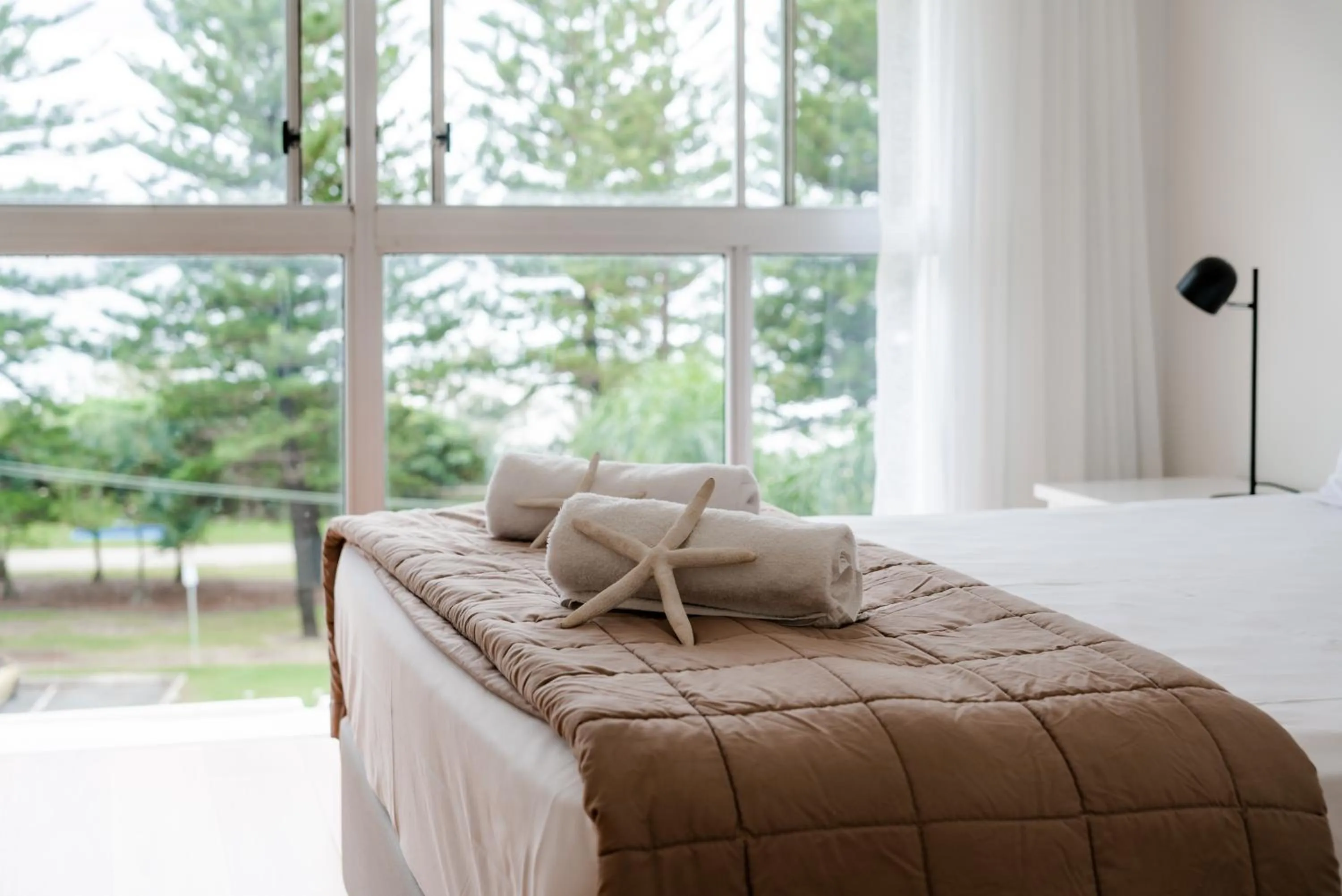 Bed in Cashelmara Beachfront Apartments