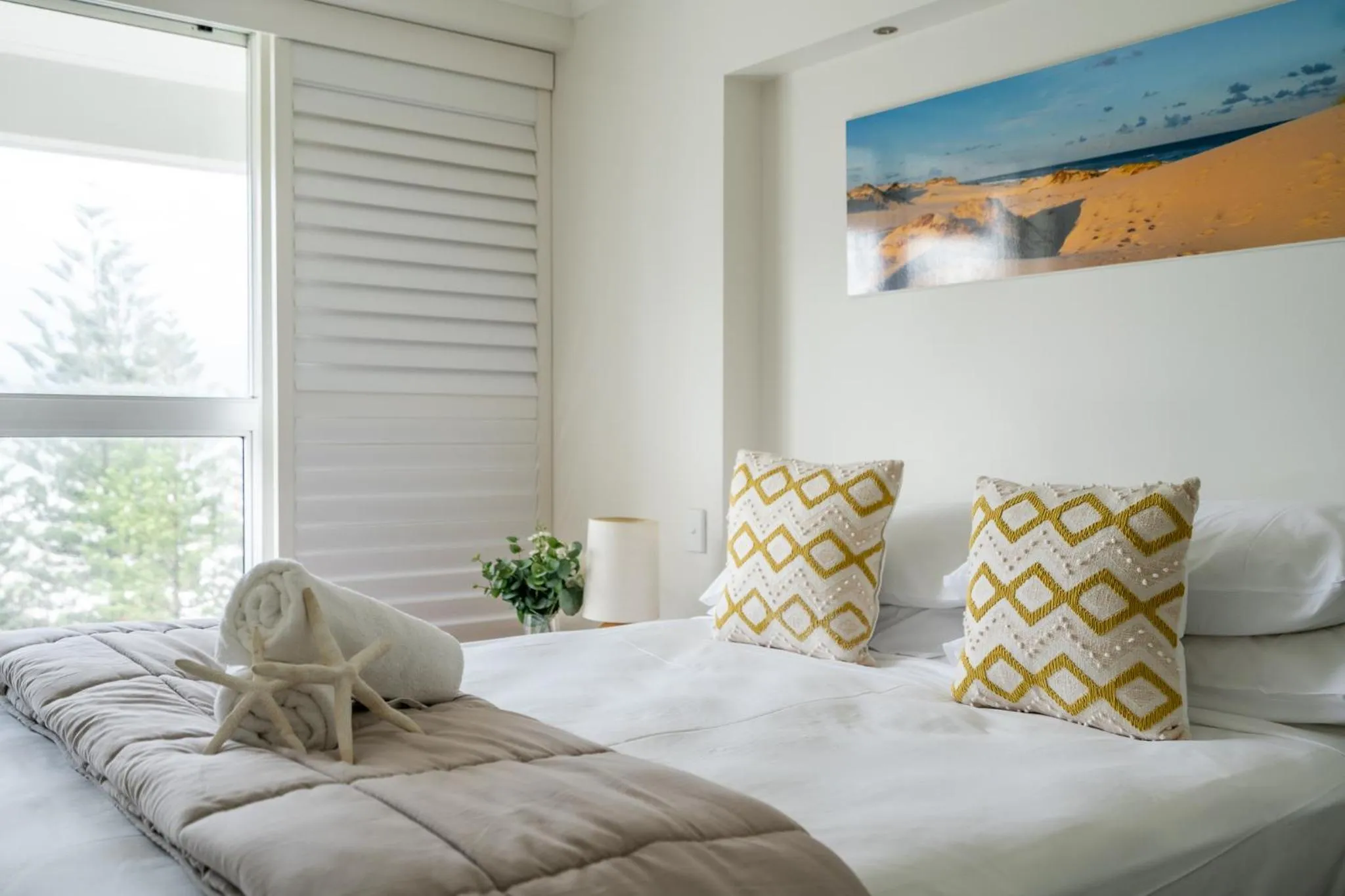 Bed in Cashelmara Beachfront Apartments