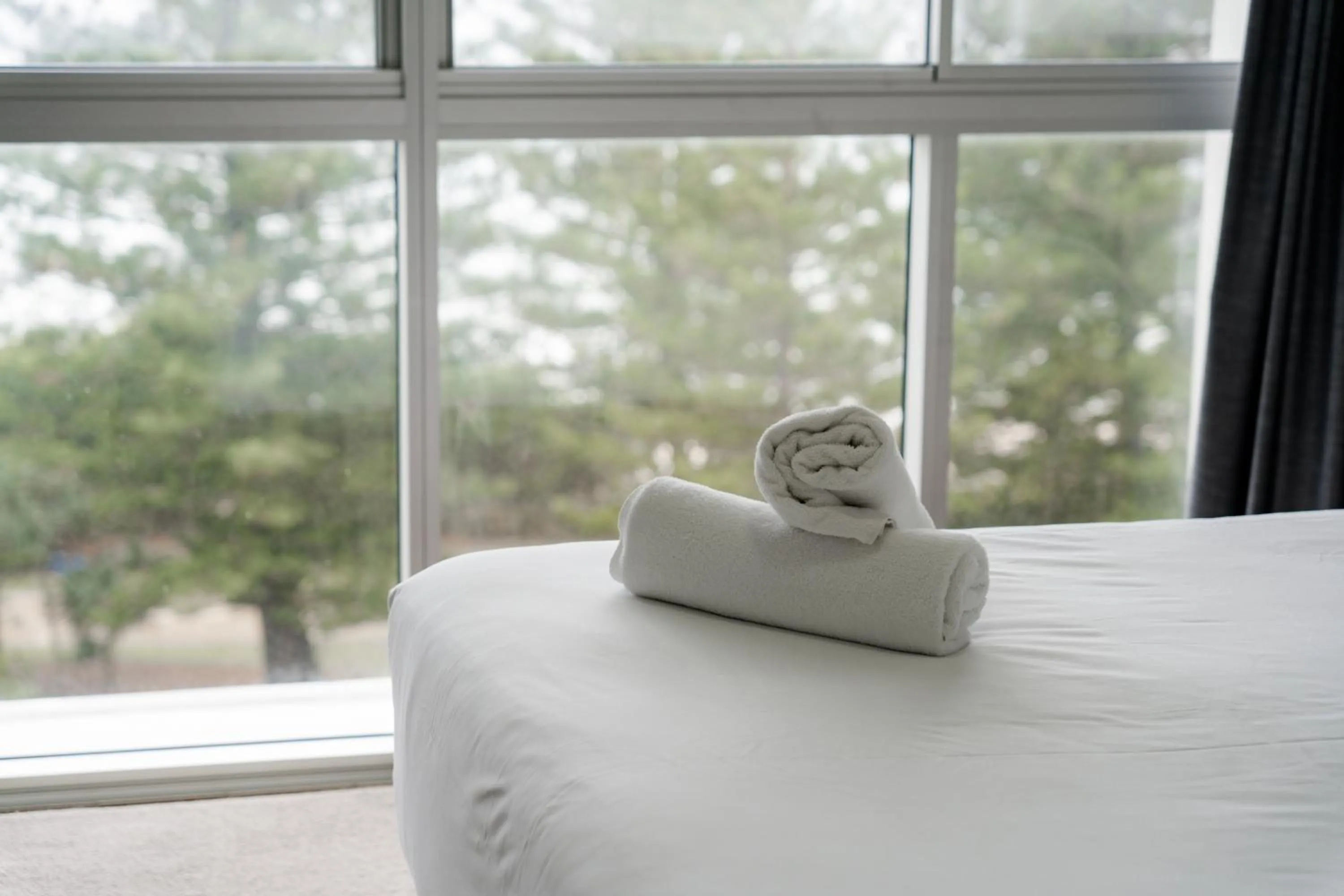 Bed in Cashelmara Beachfront Apartments