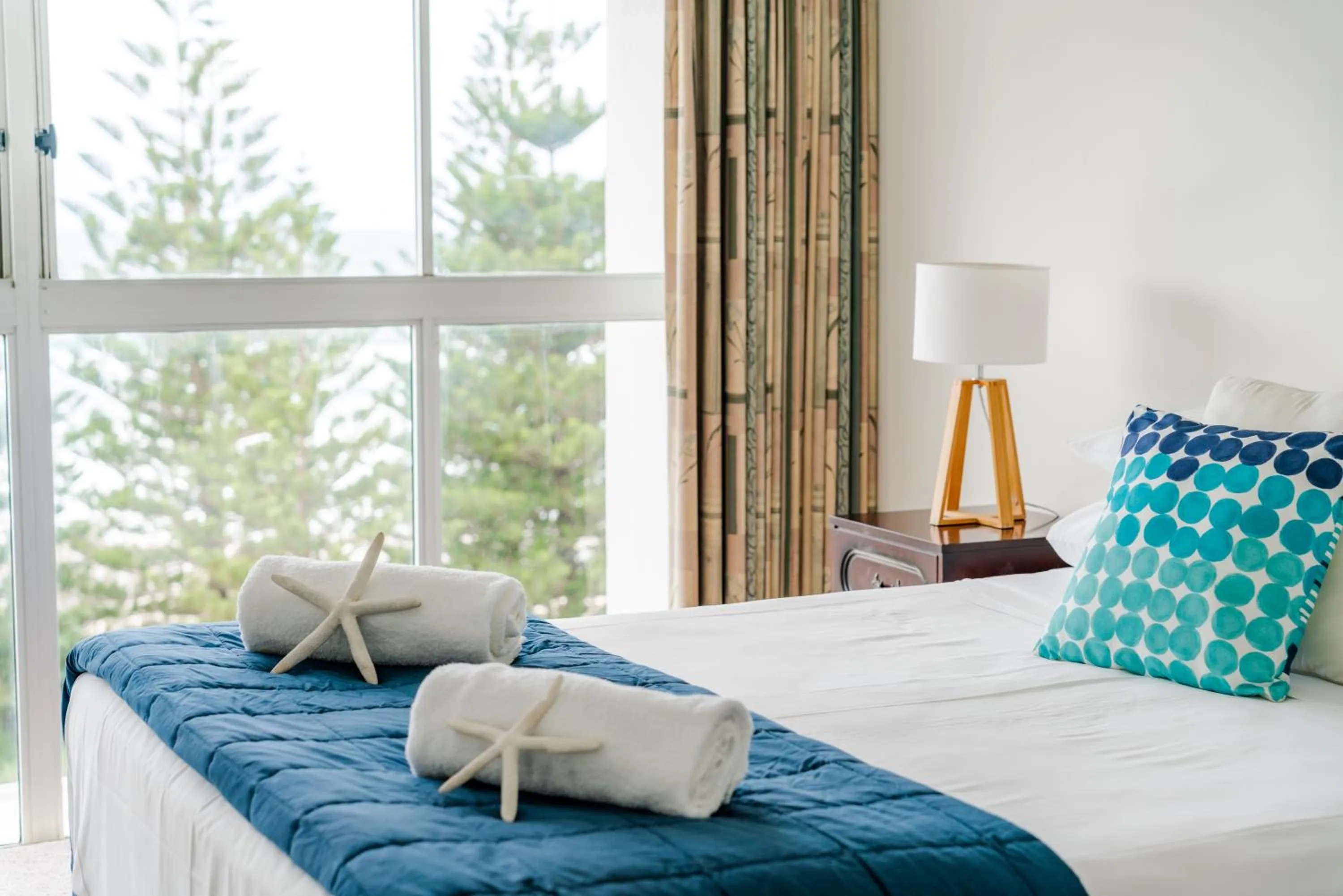 Bed in Cashelmara Beachfront Apartments