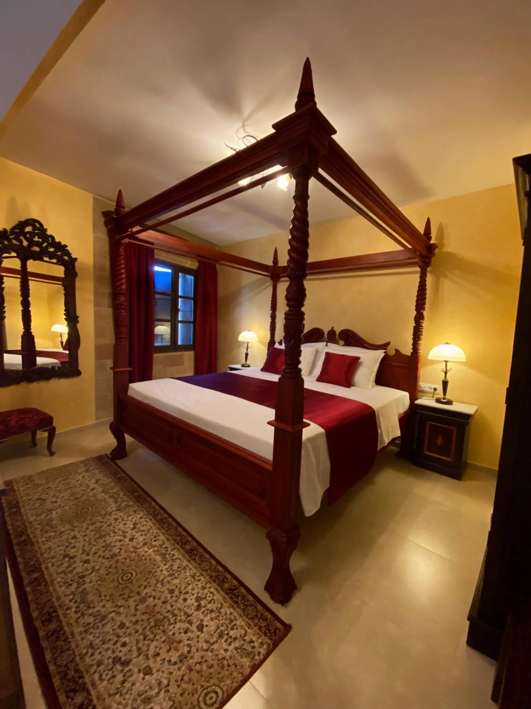 Bed in S.Nikolis' Historic Boutique Hotel