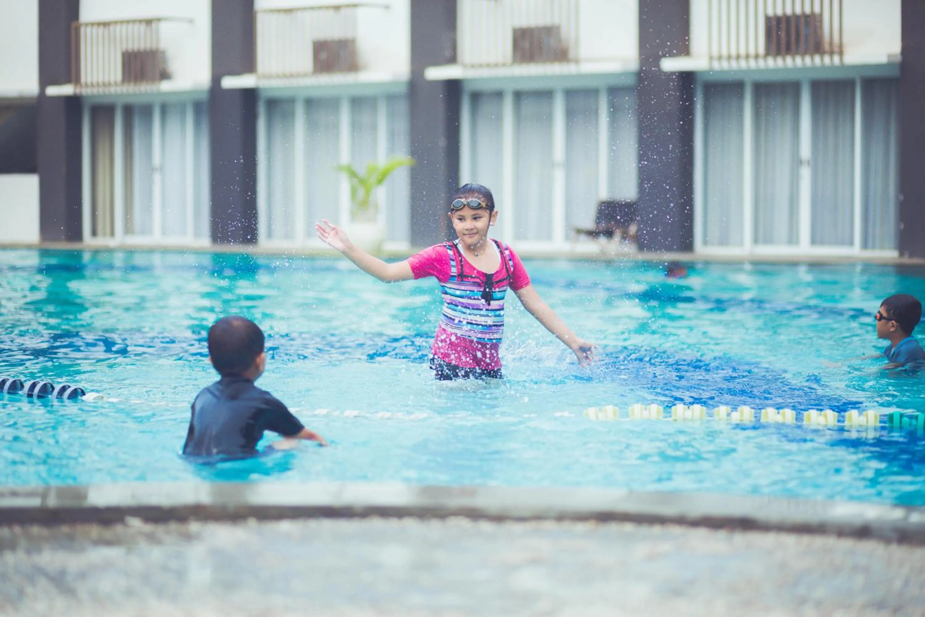 Swimming pool in Front One Akshaya Hotel Karawang
