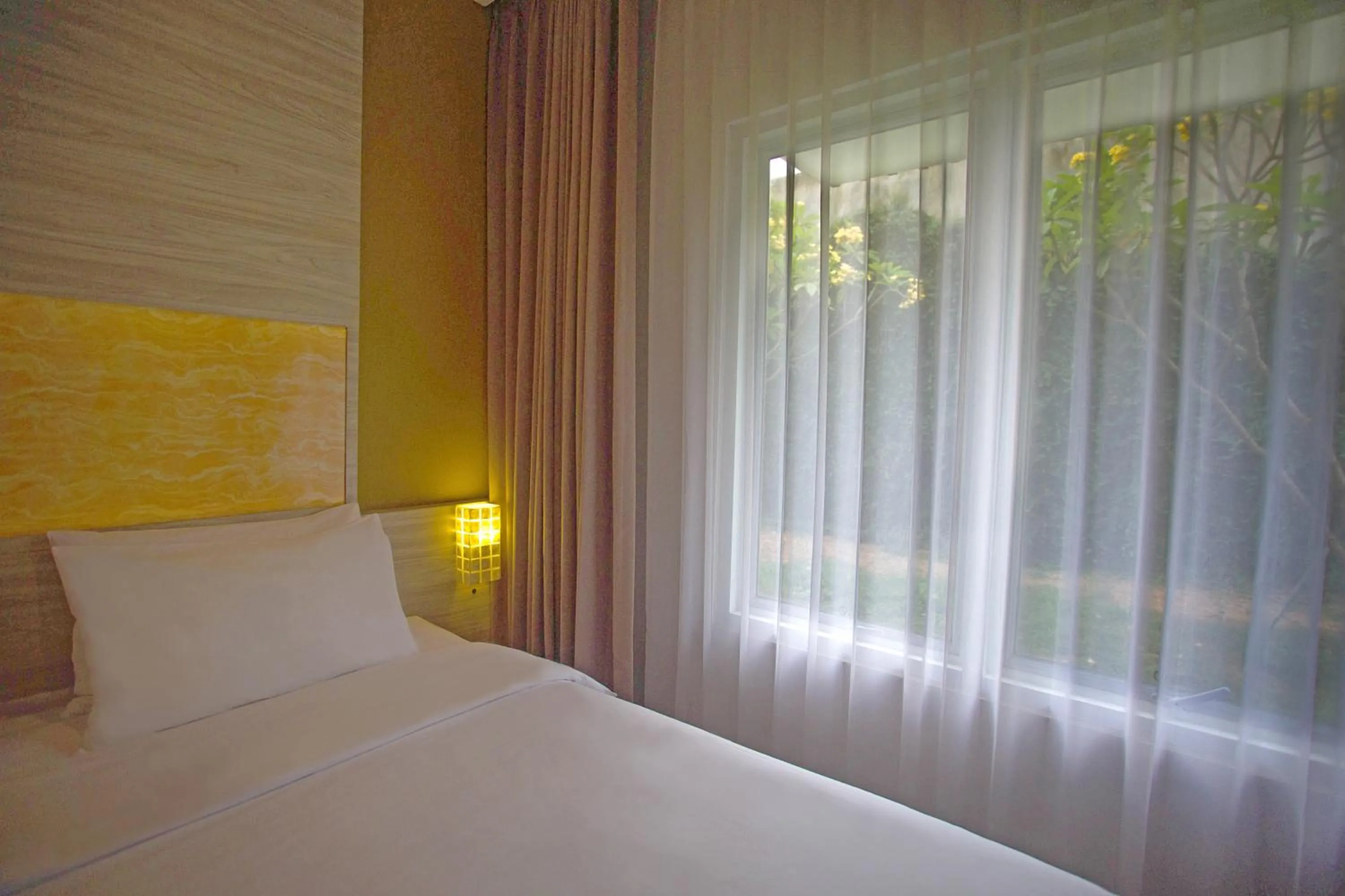Bed in Front One Akshaya Hotel Karawang