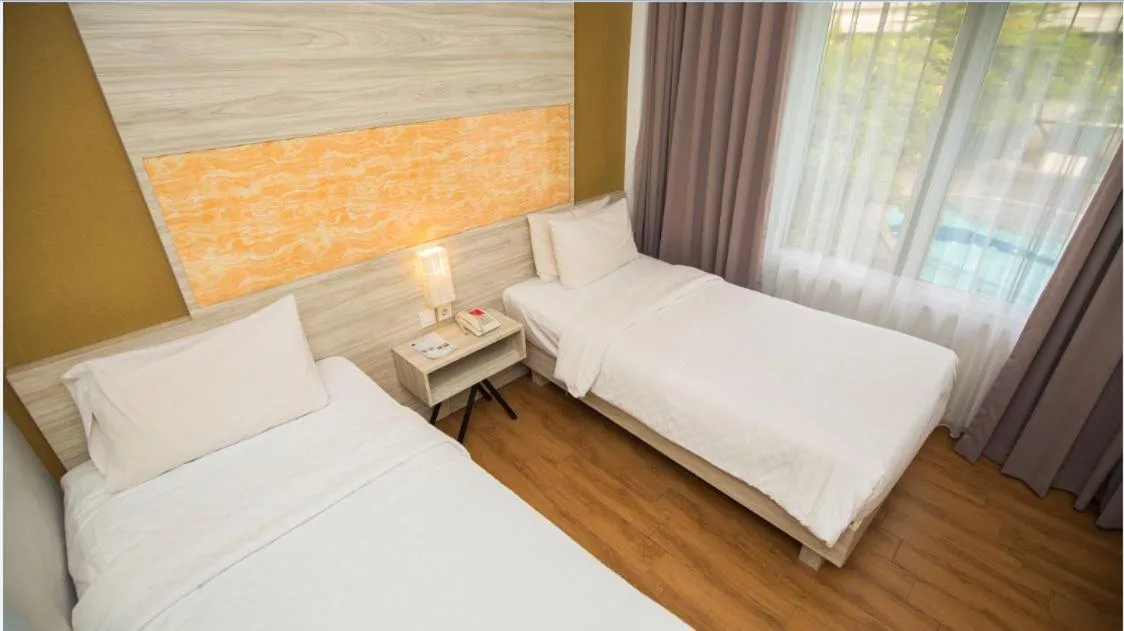Bed in Front One Akshaya Hotel Karawang