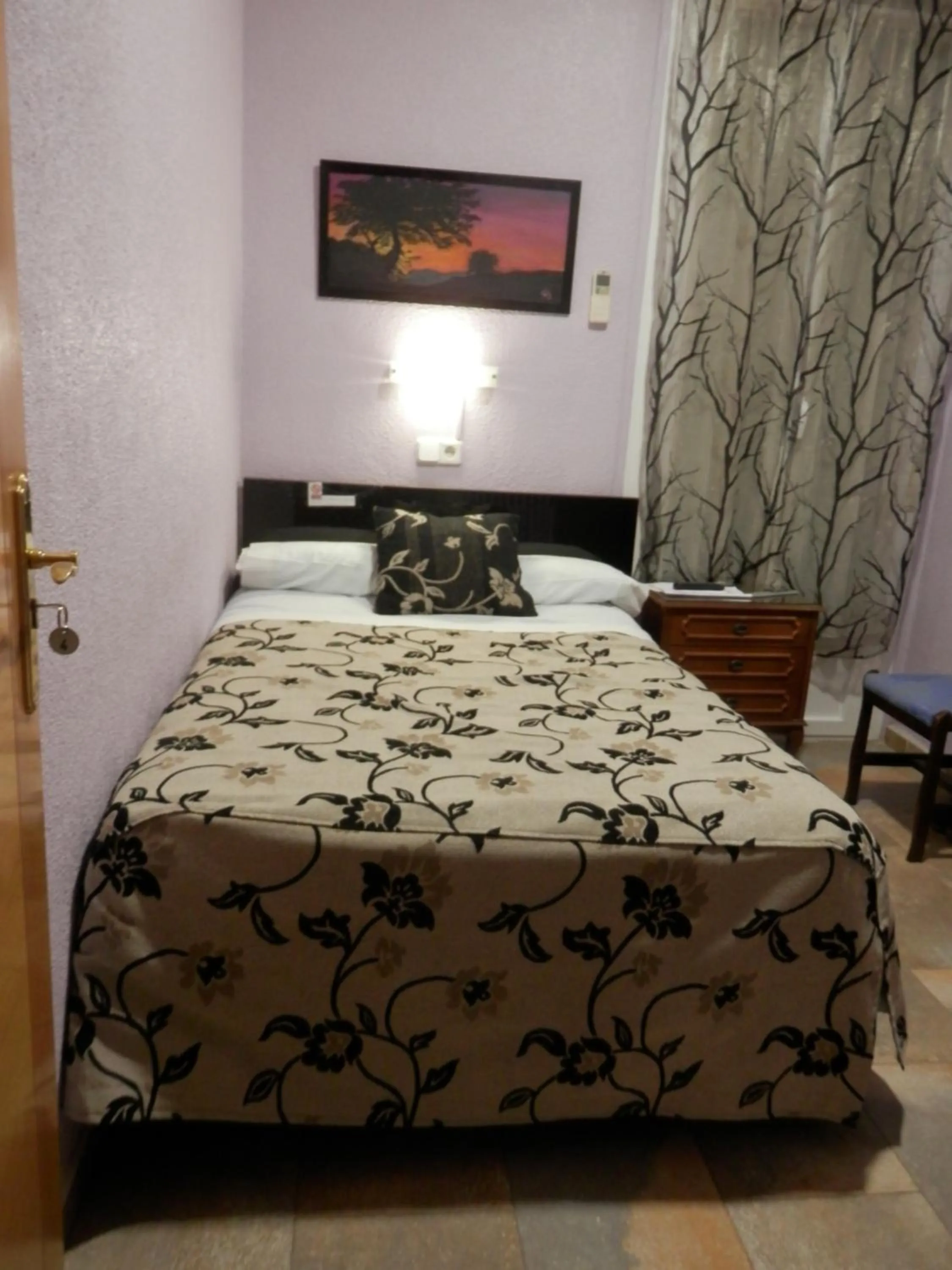 Bed in Hostal del Pez Azul