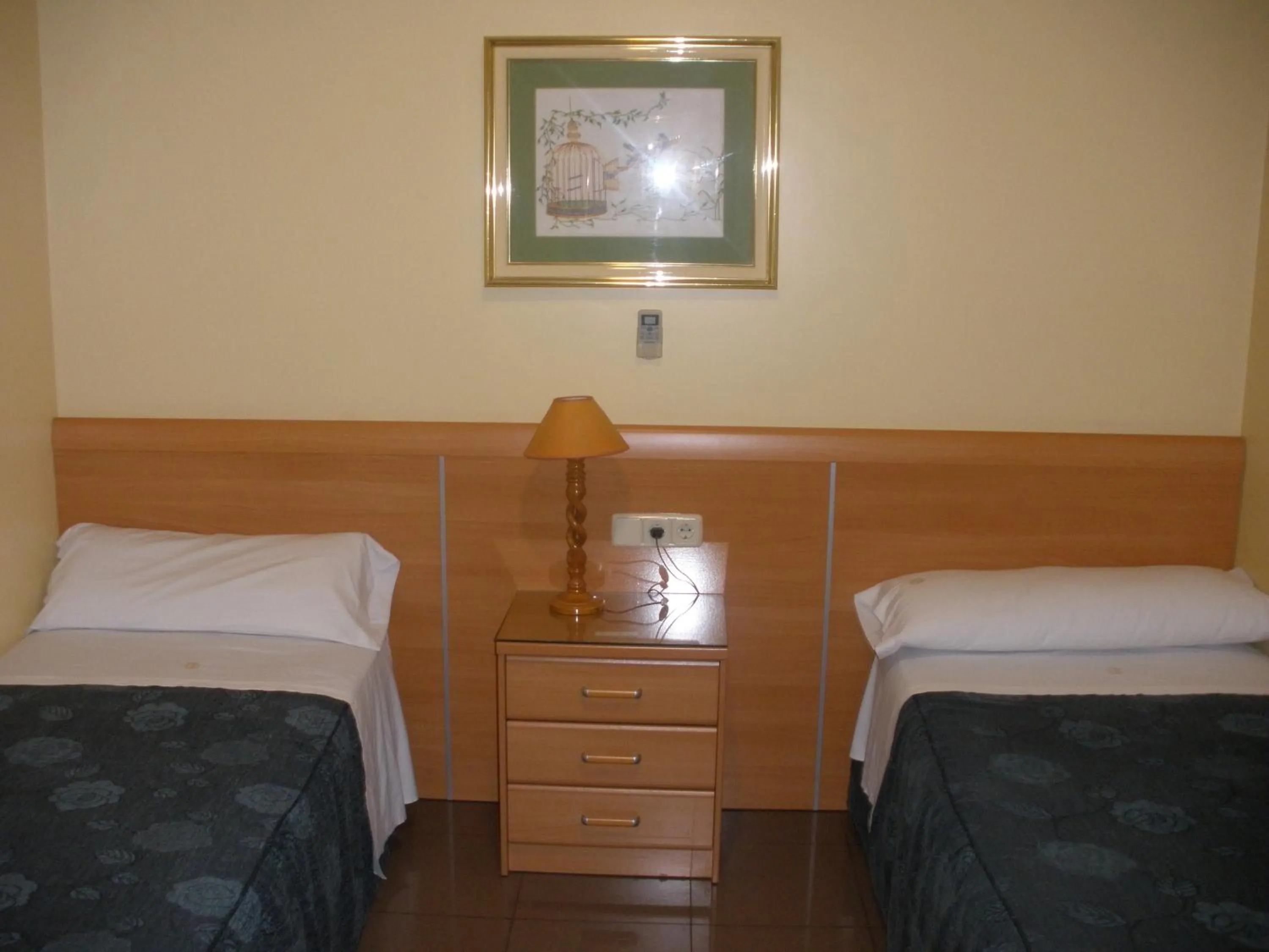 Bed in Hostal del Pez Azul