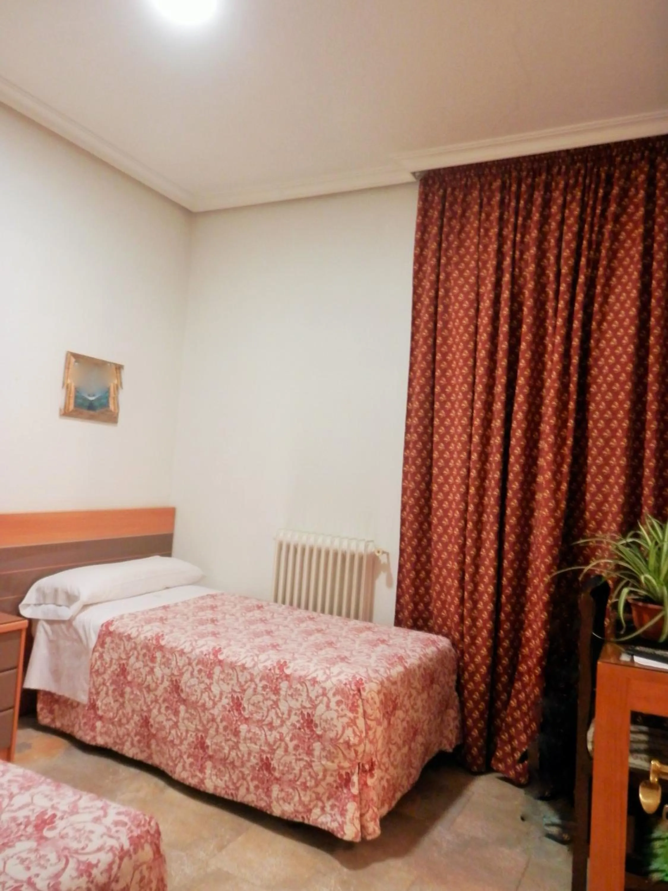 Photo of the whole room, Bed in Hostal del Pez Azul