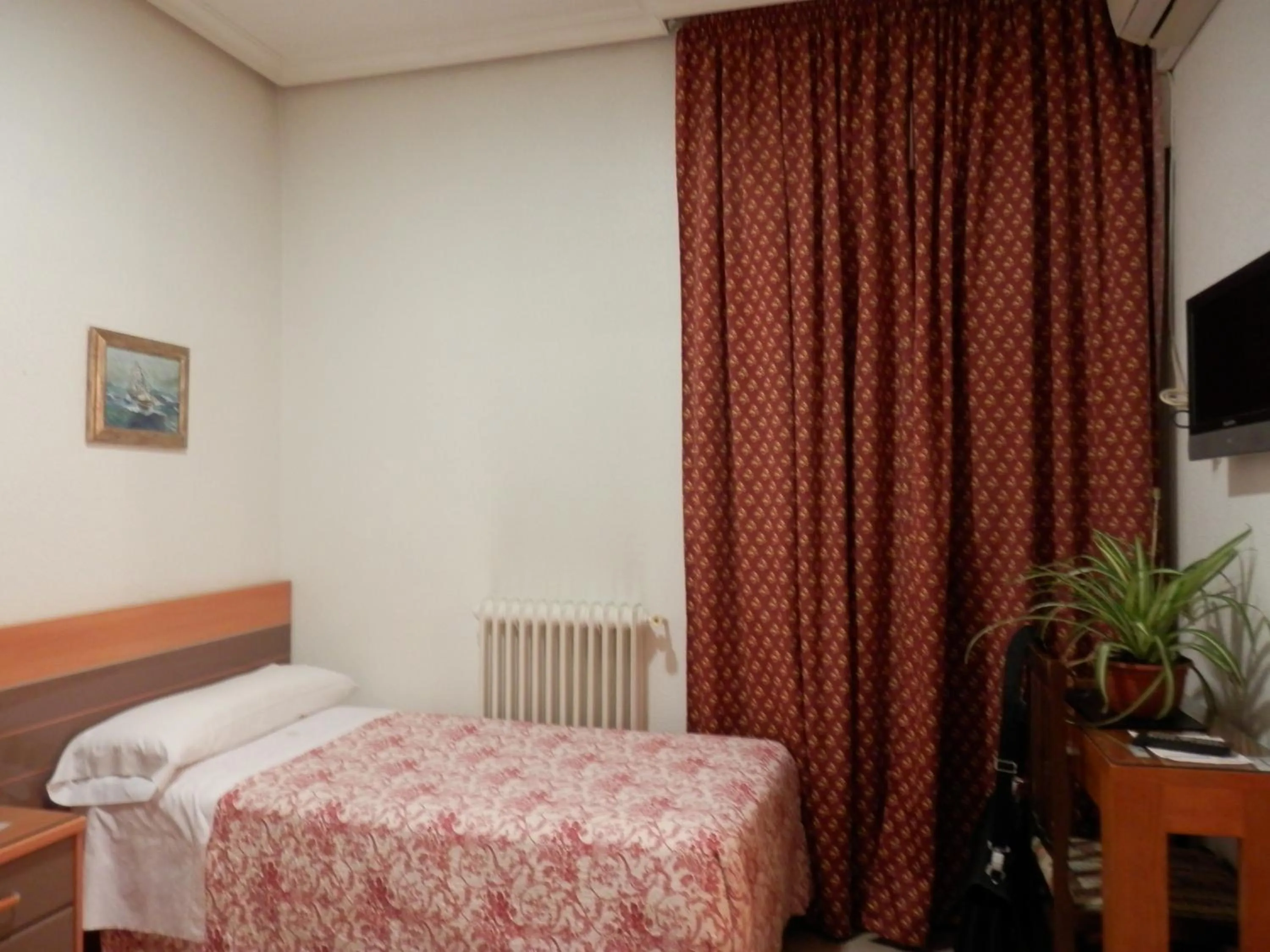 Bed in Hostal del Pez Azul