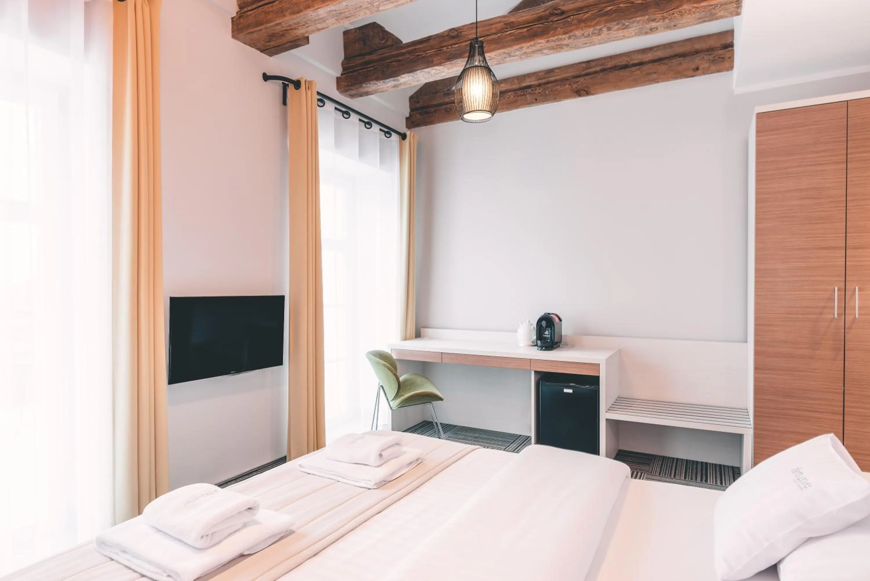 Bed in Fortune Old Town boutique hotel