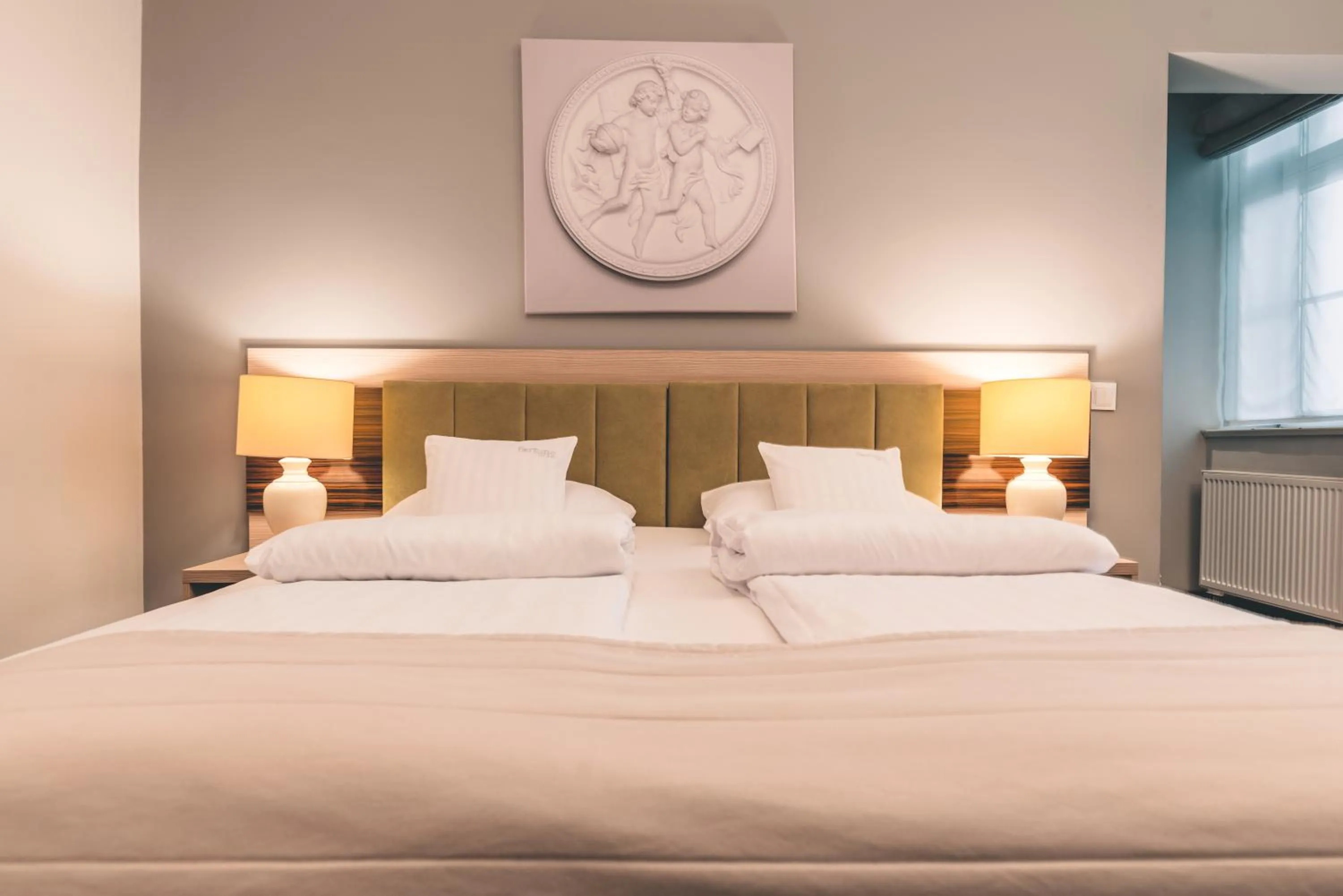 Bed in Fortune Old Town boutique hotel