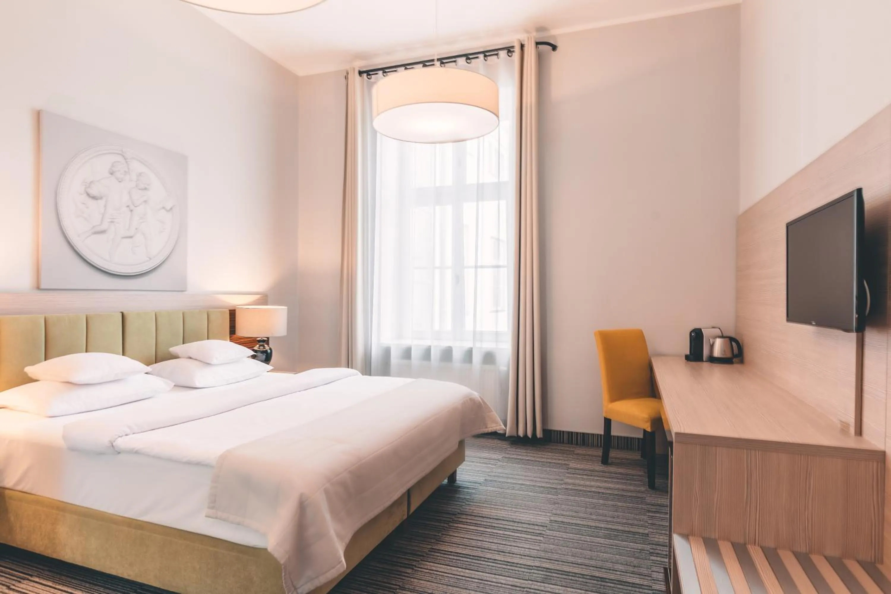 Bed in Fortune Old Town boutique hotel