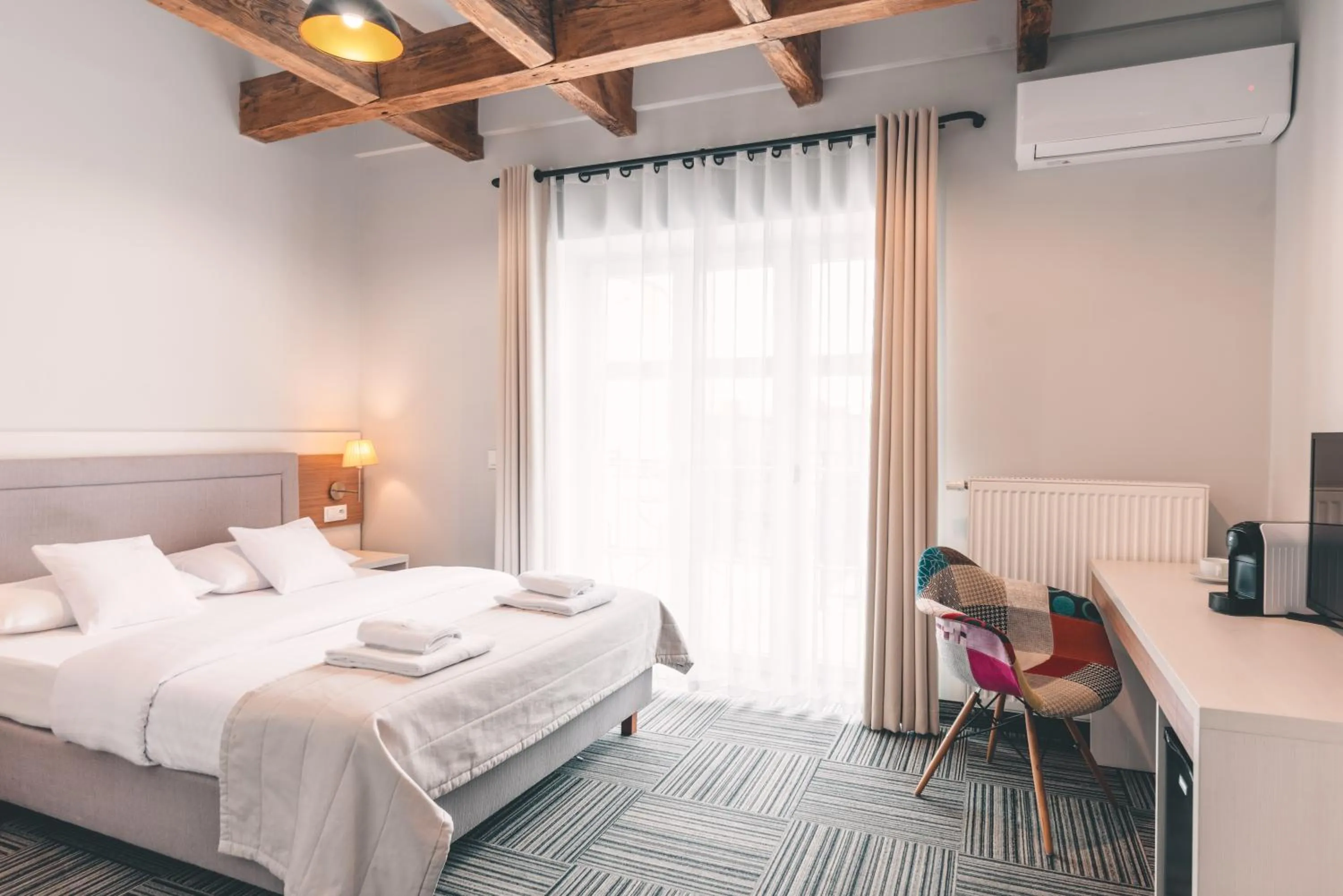 Bed in Fortune Old Town boutique hotel