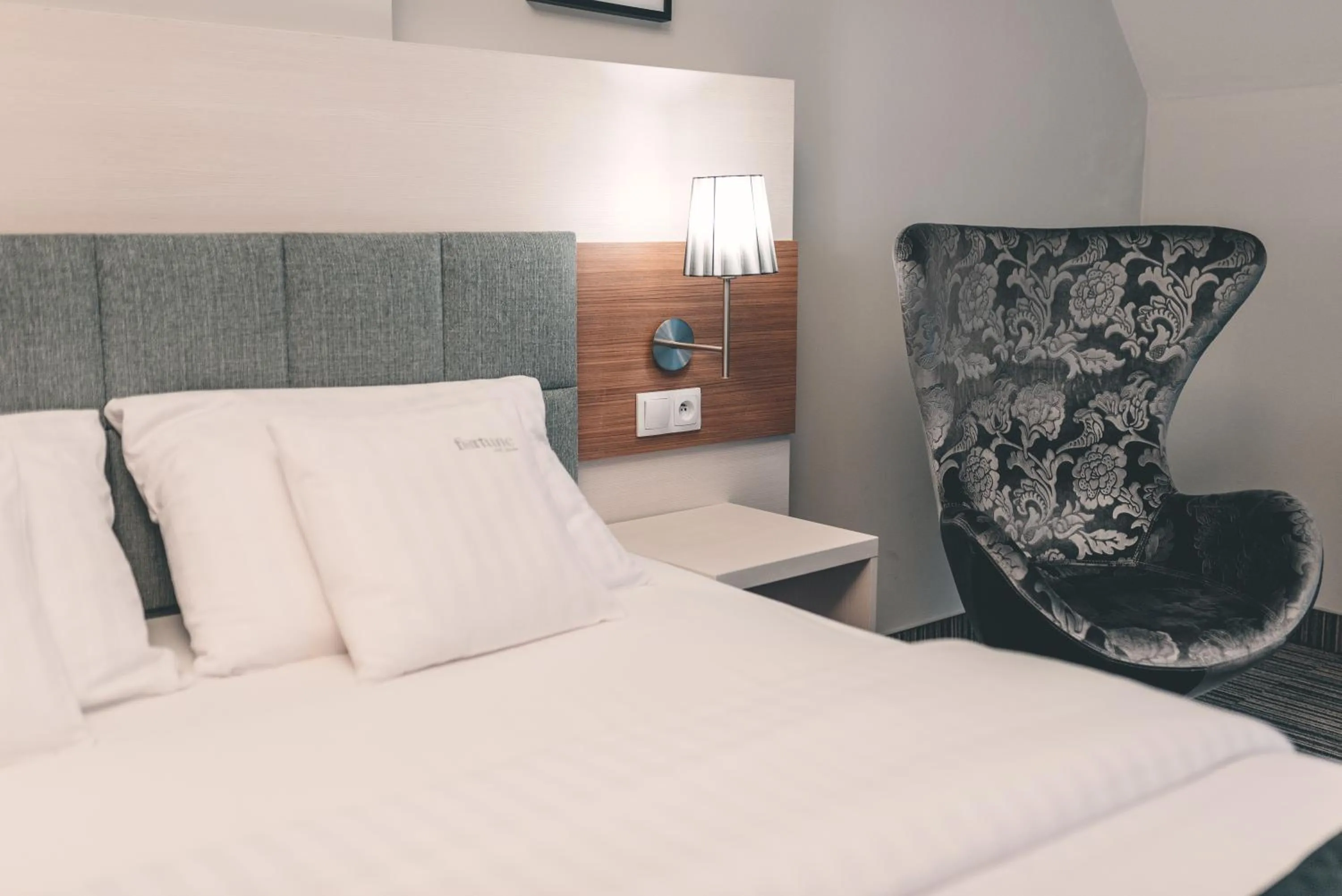 Bed in Fortune Old Town boutique hotel