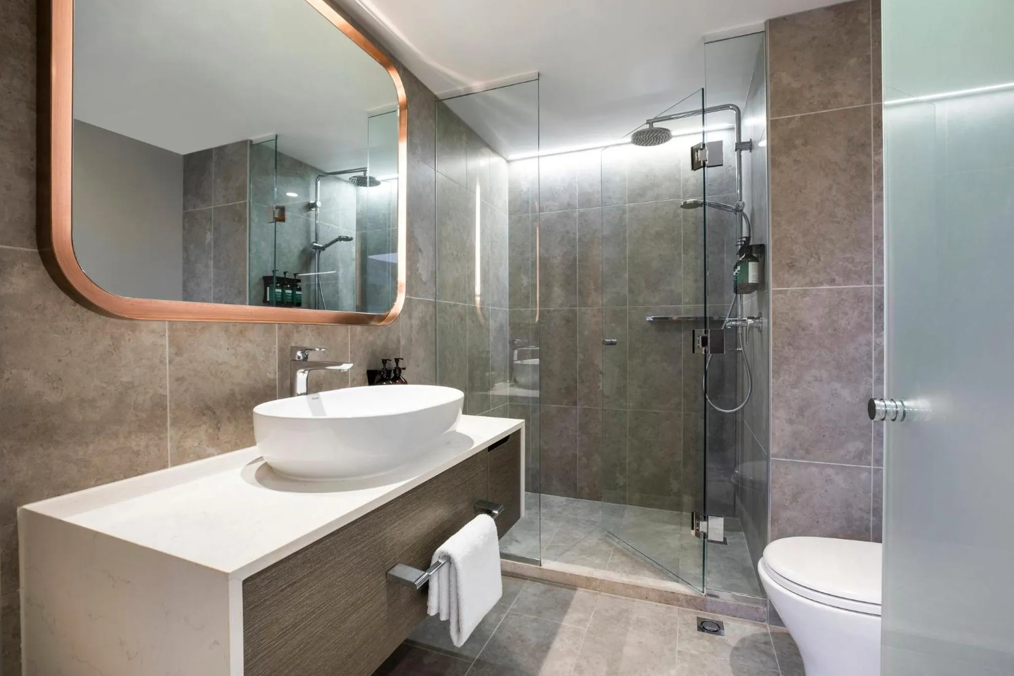 Bathroom in Crowne Plaza Melbourne by IHG