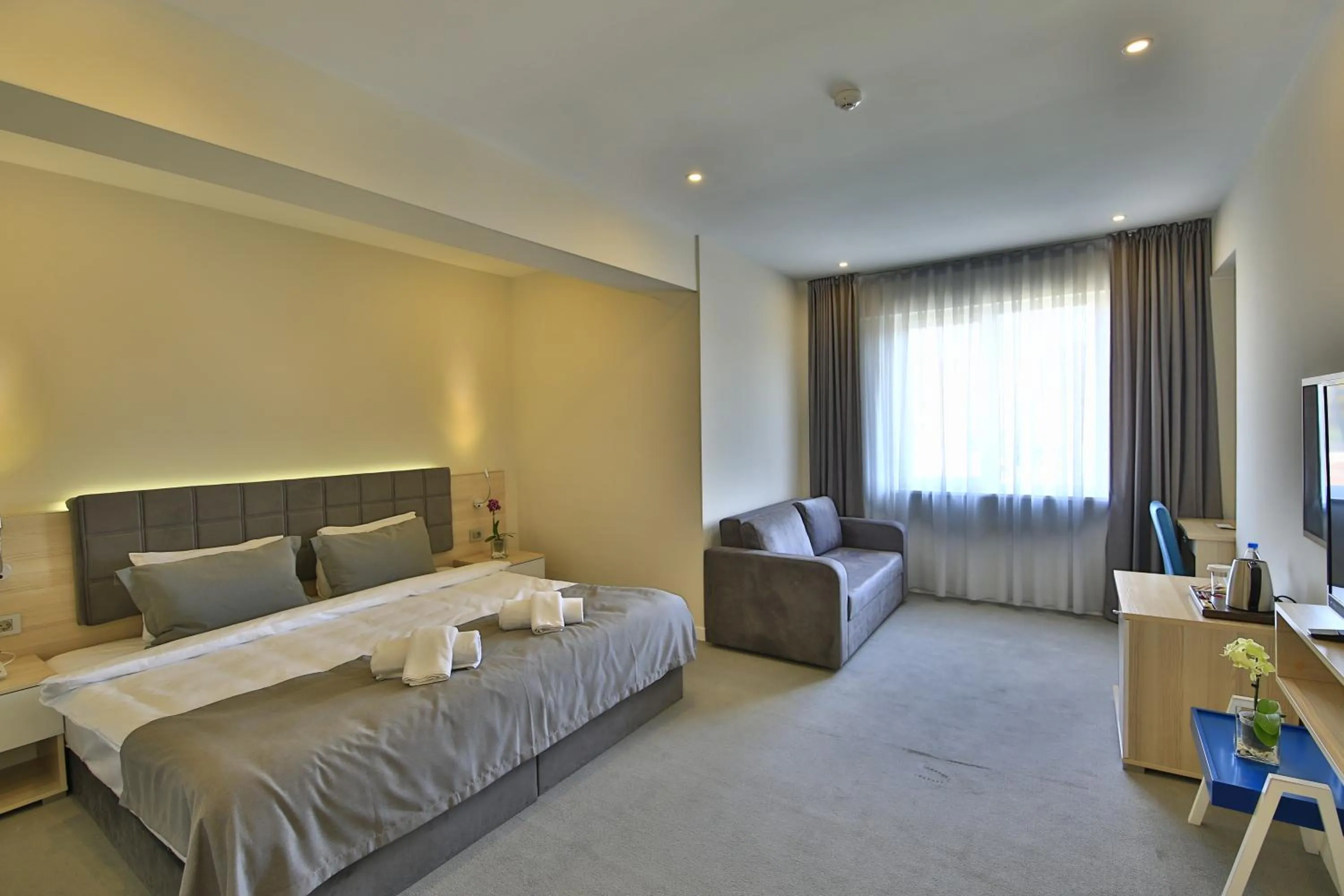 Living room, Bed in leto city hotel