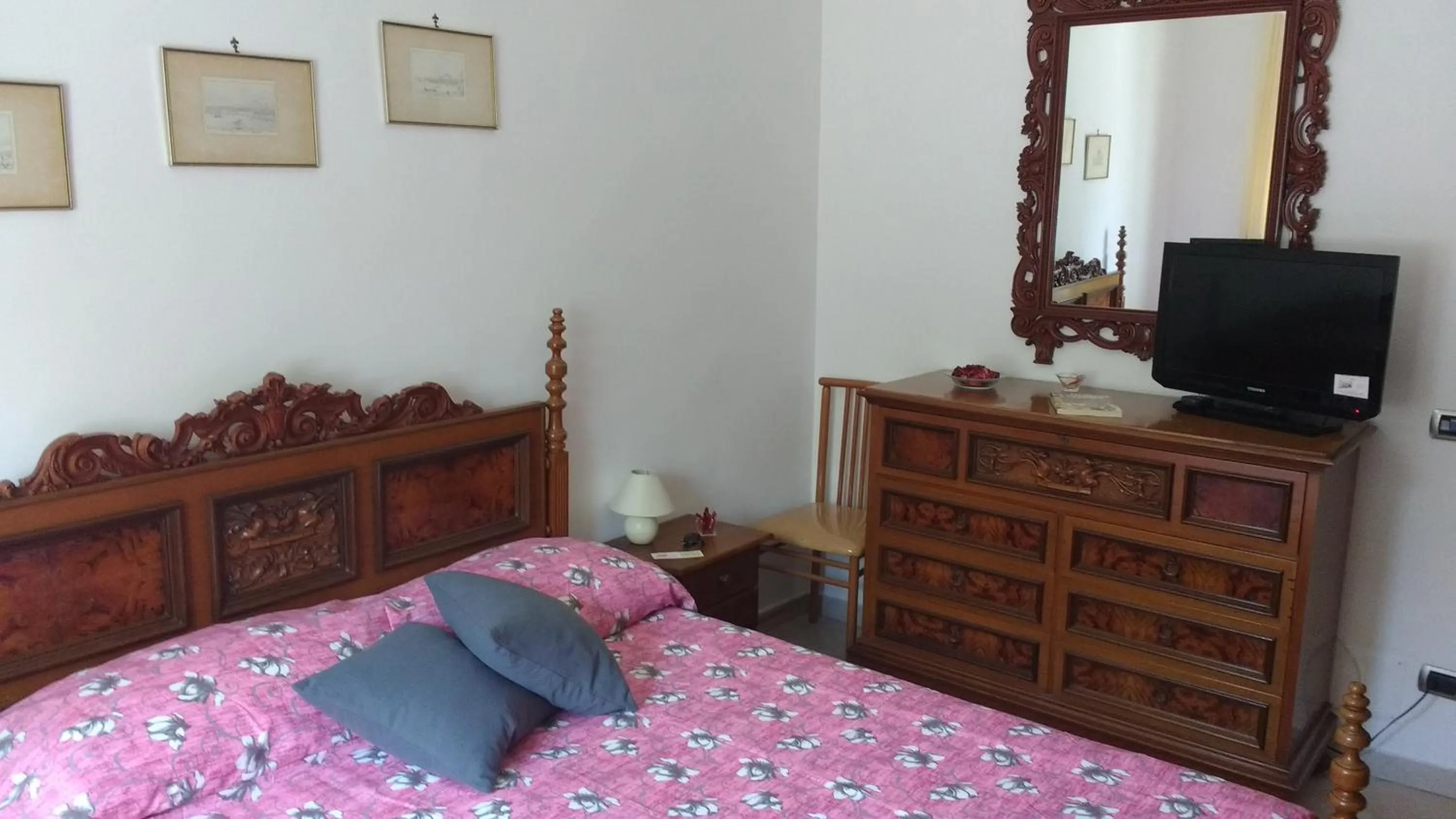 Photo of the whole room, Bed in A Casa di Arturo