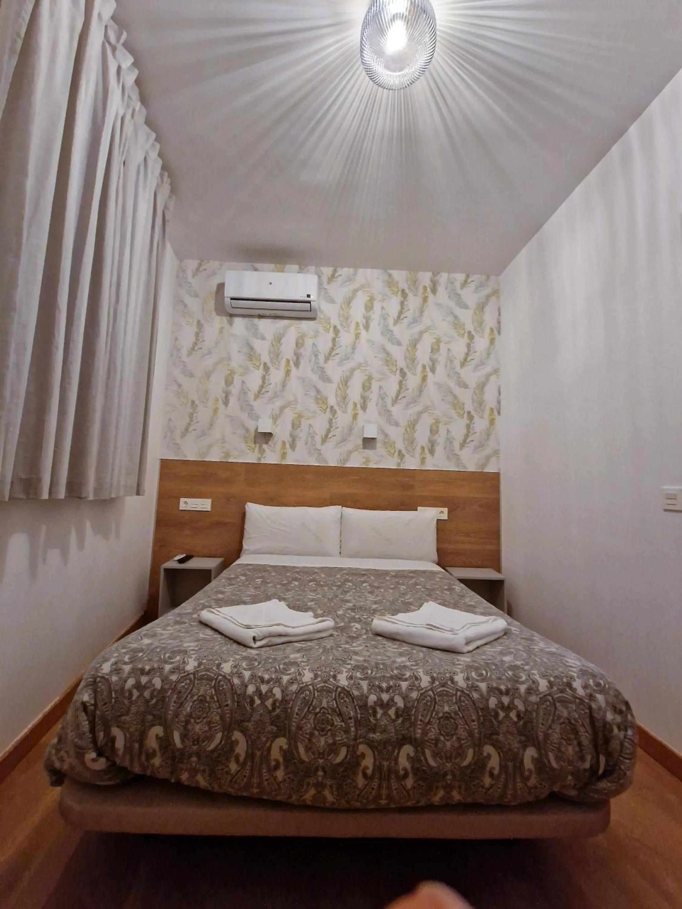 Bed in Hostal A Nuestra Senora de La Paloma