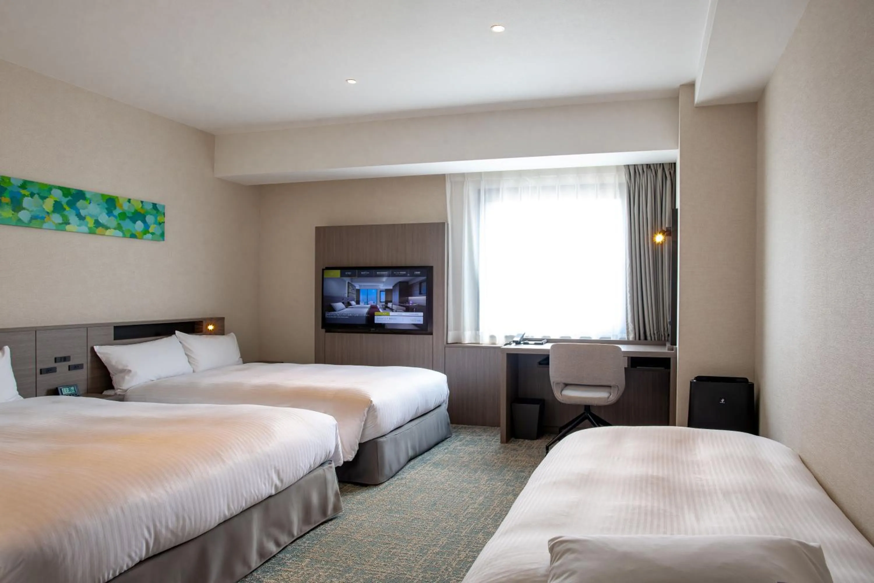 Bed in Hotel Emisia Tokyo Tachikawa