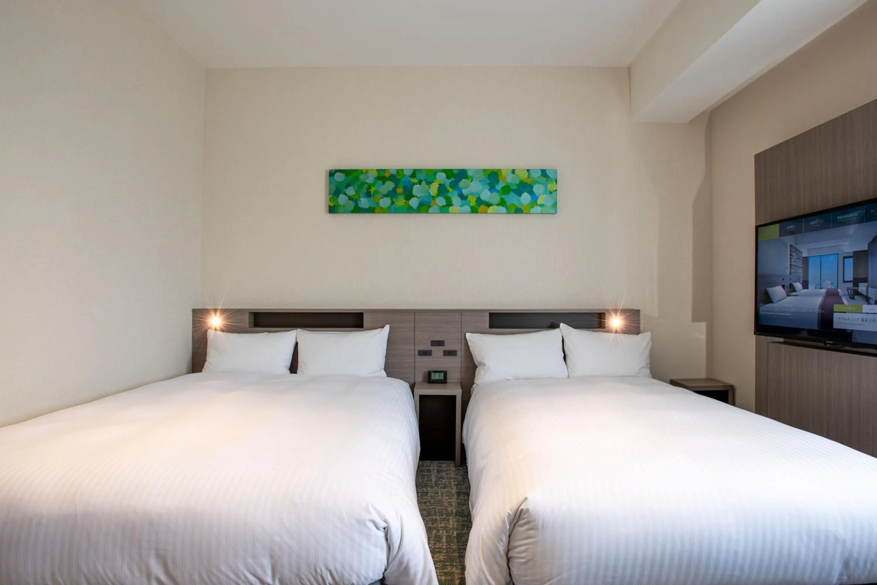 Bed in Hotel Emisia Tokyo Tachikawa