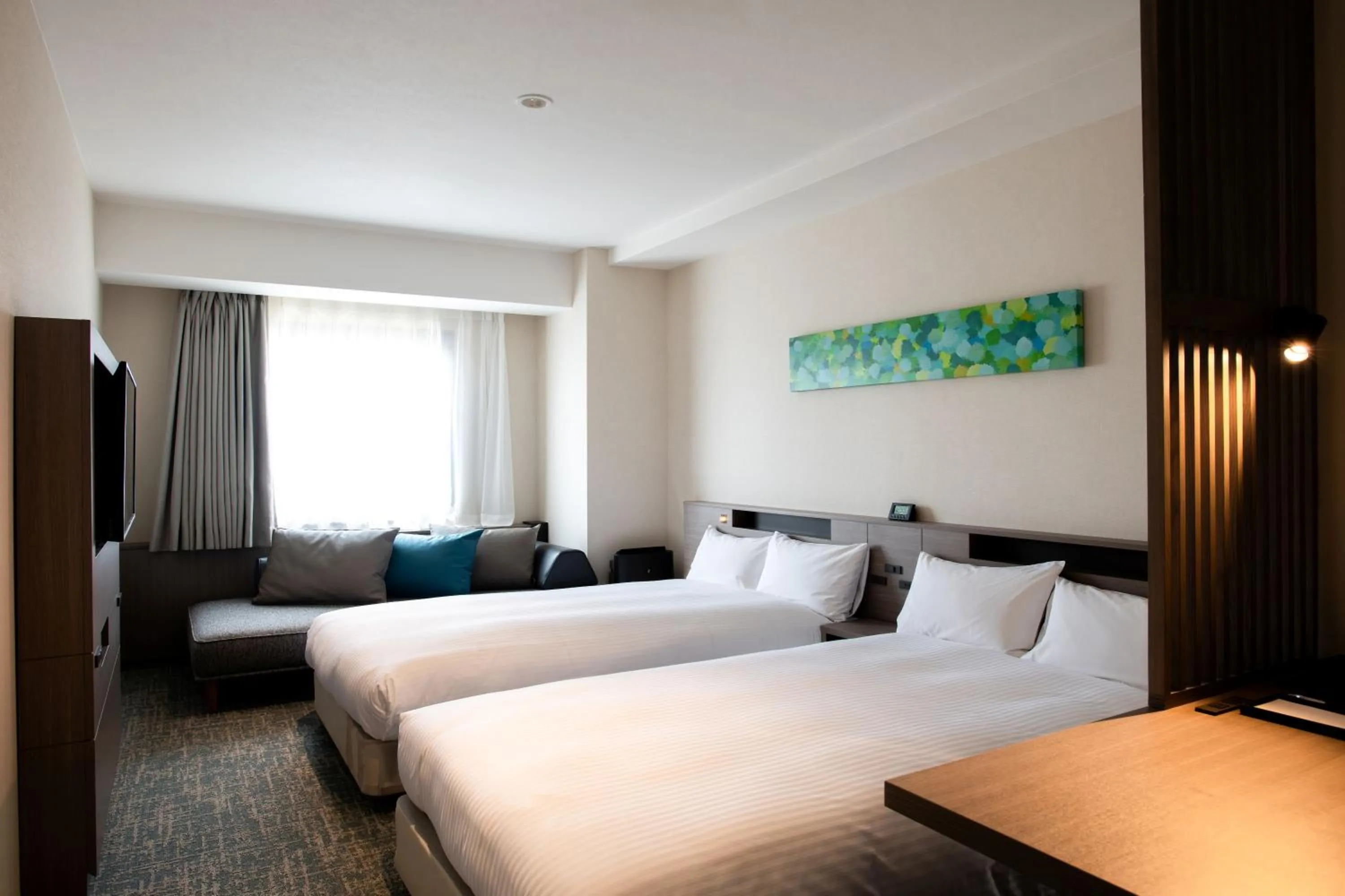 Bed in Hotel Emisia Tokyo Tachikawa