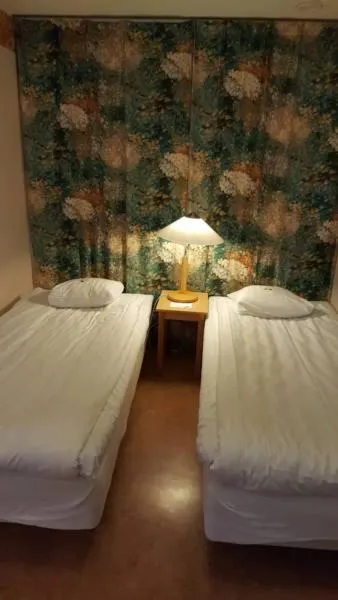 Bed in Hotell Sport & Rest