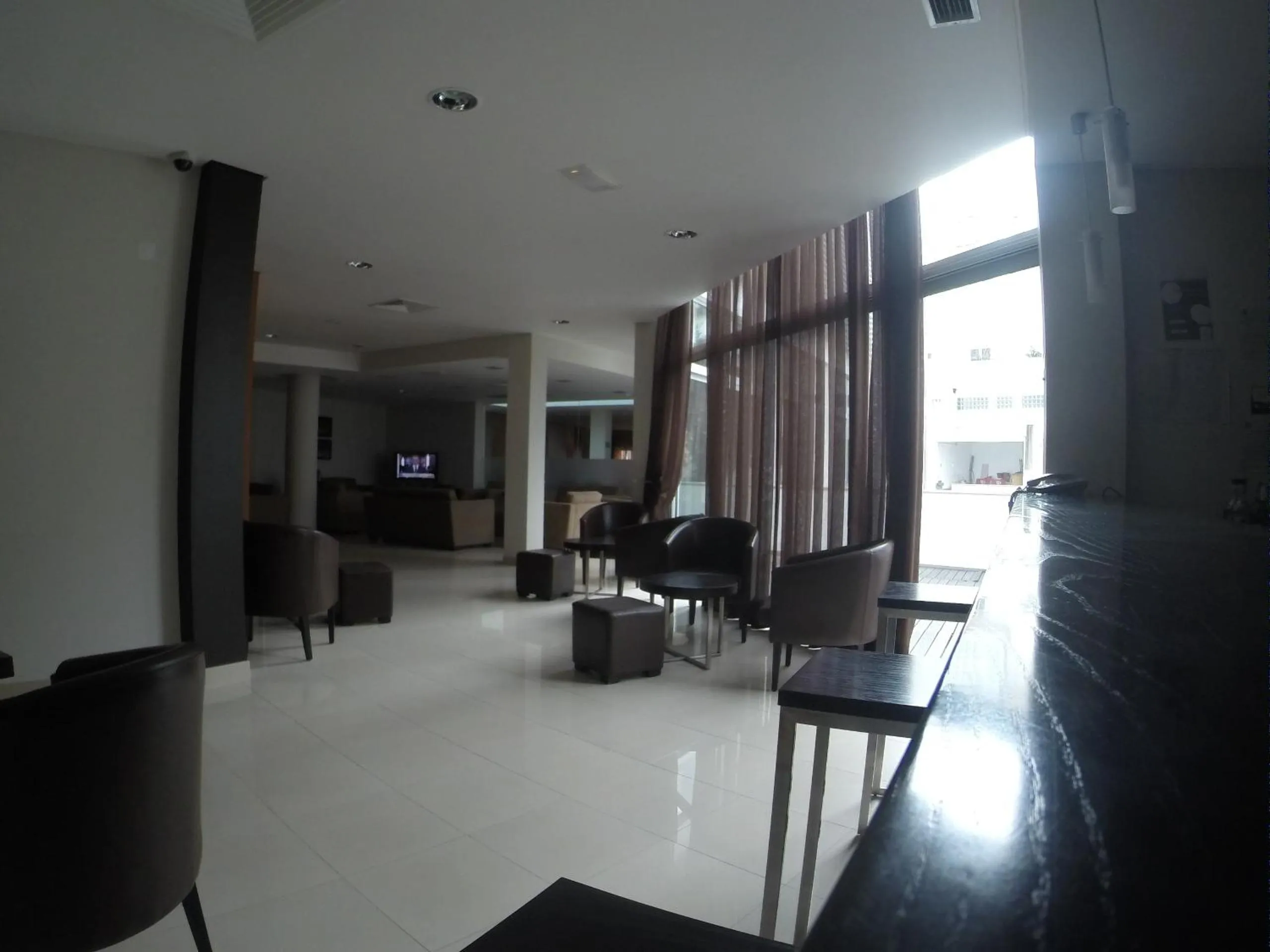 Communal lounge/ TV room in Hotel Recinto