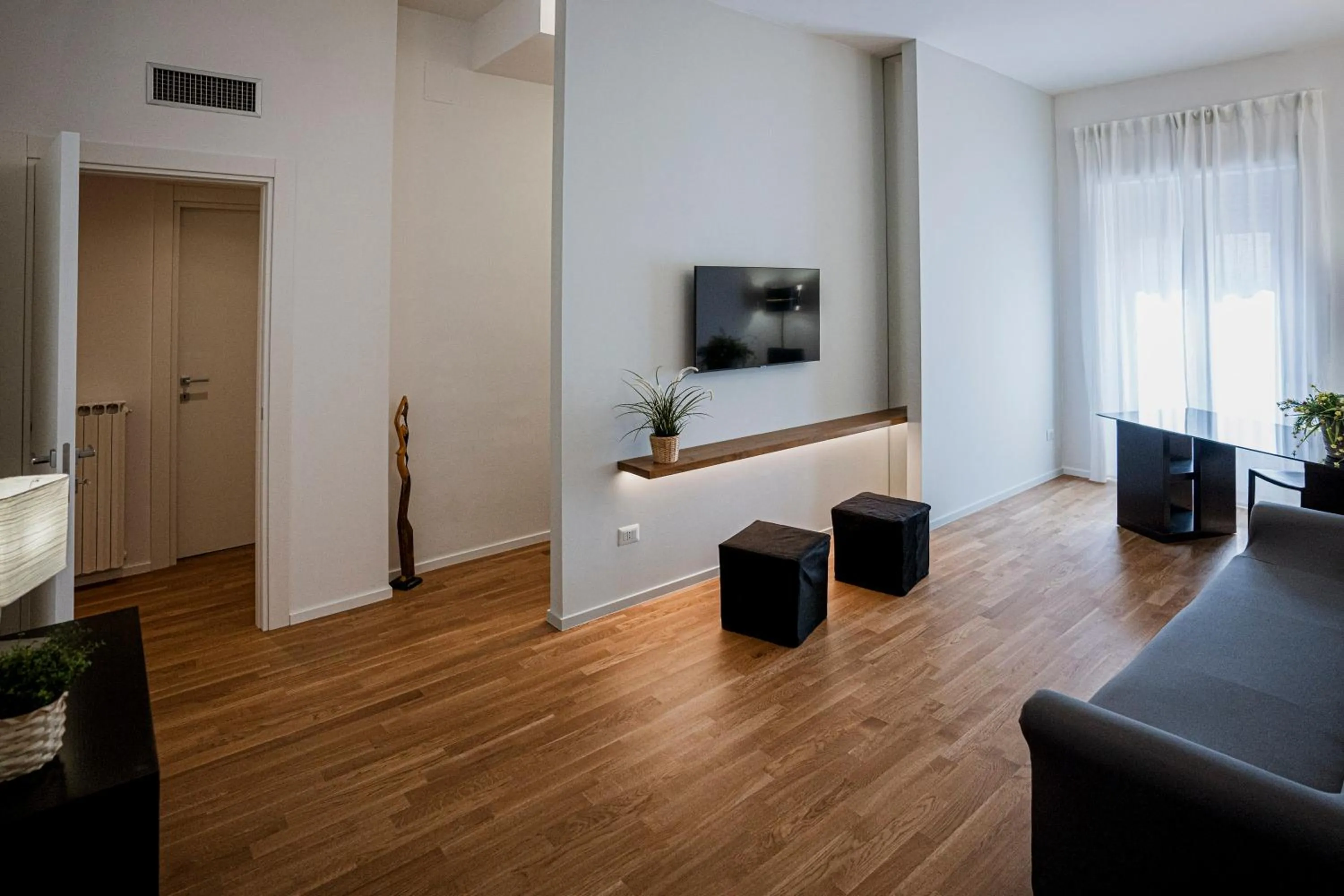 Communal lounge/ TV room in Dimora al Mulino