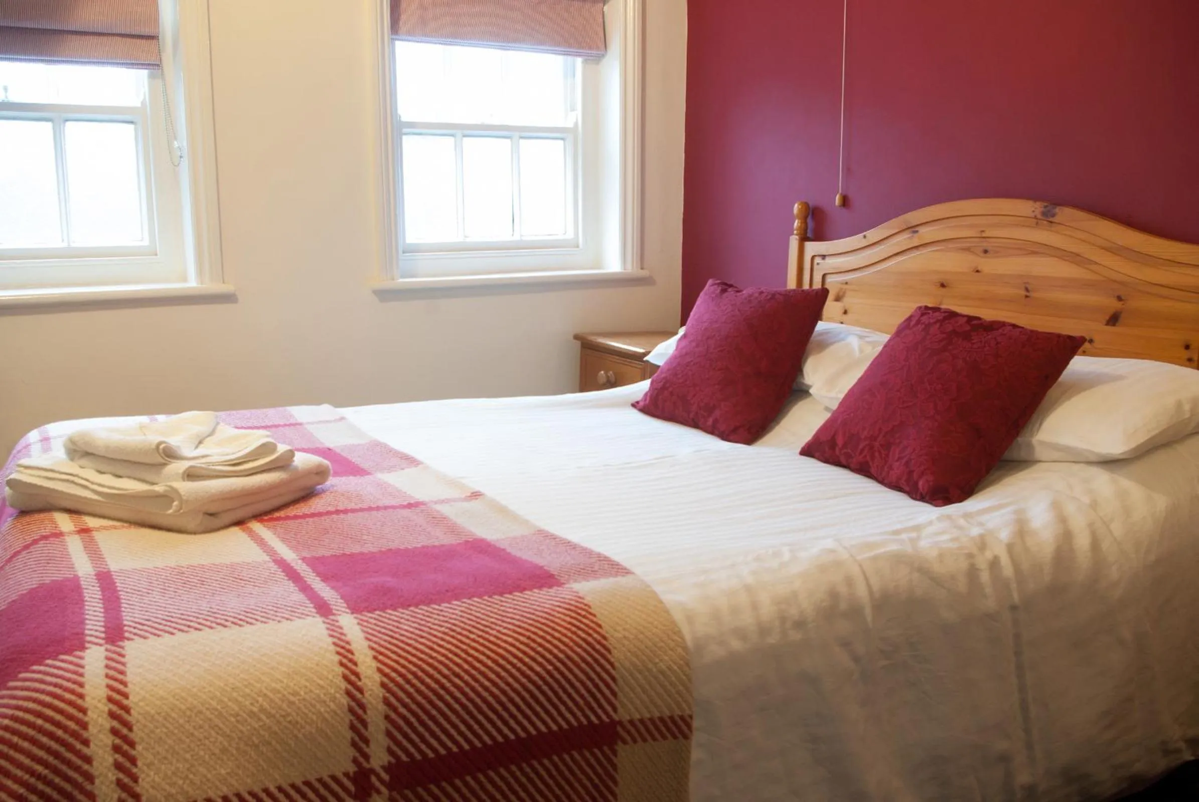 Bed in The Dragon Hotel