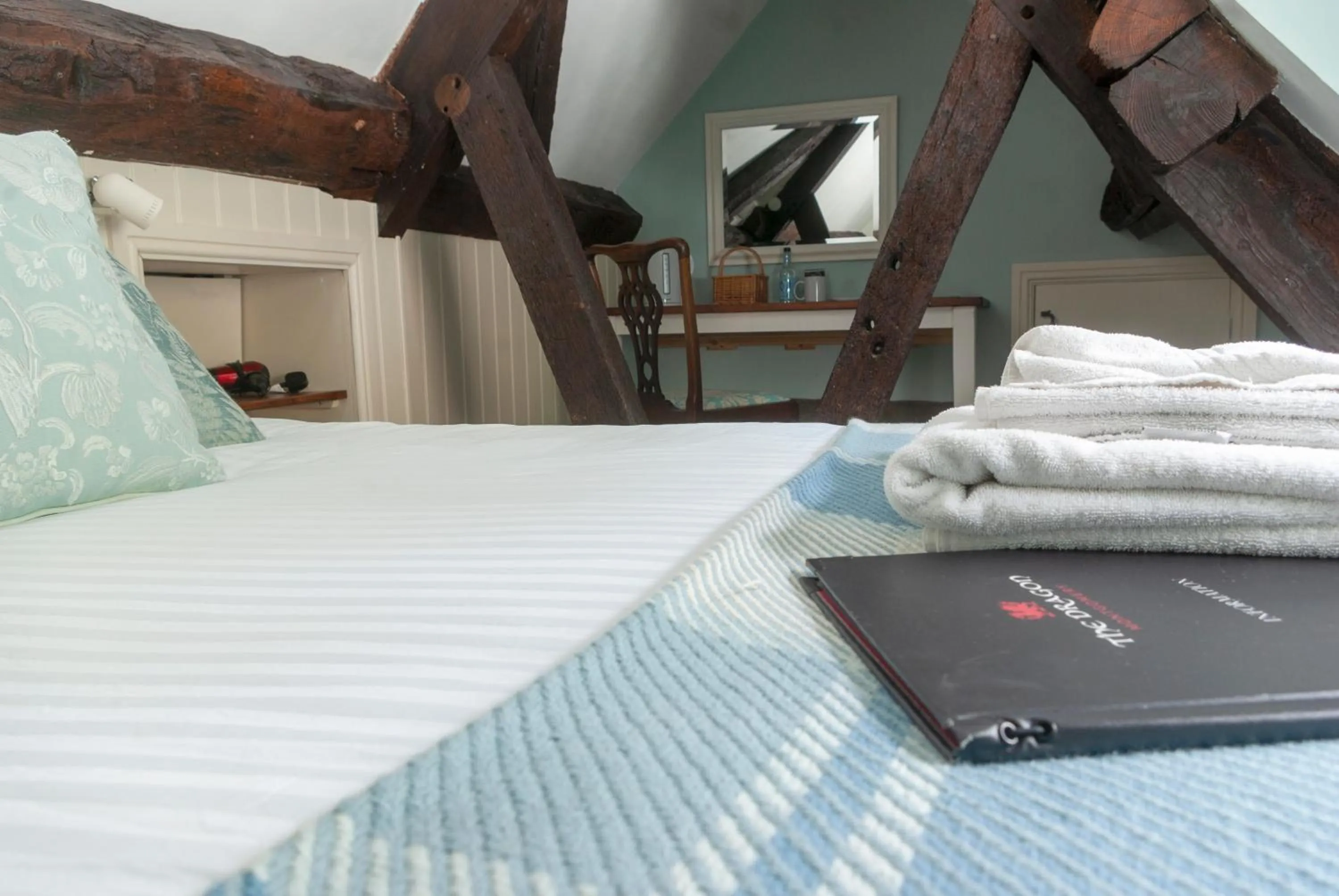 Bed in The Dragon Hotel