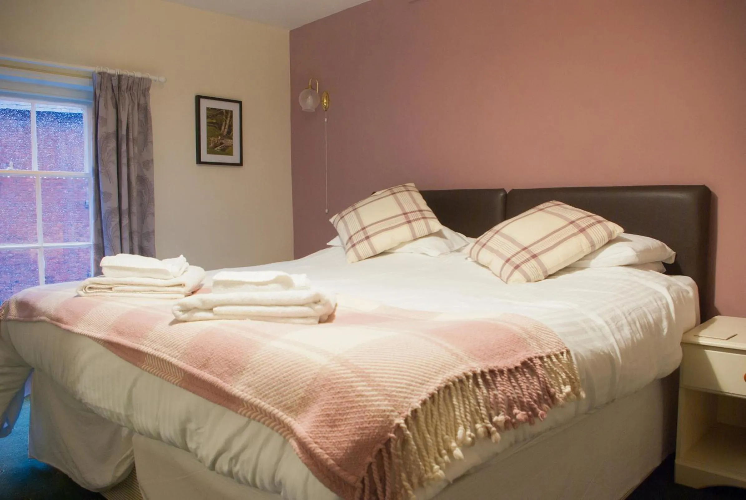 Bed in The Dragon Hotel