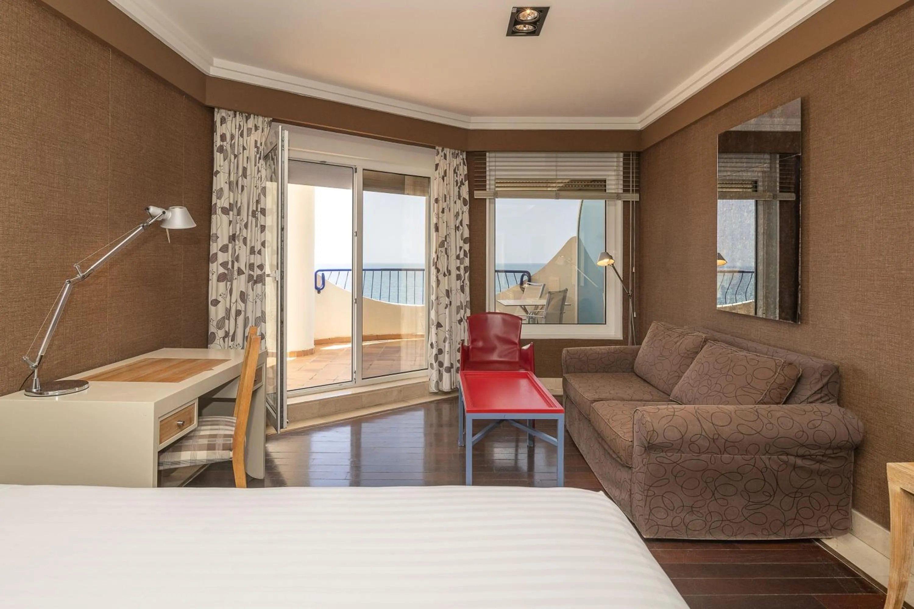 Seating area, Bed in Hotel Playa Victoria