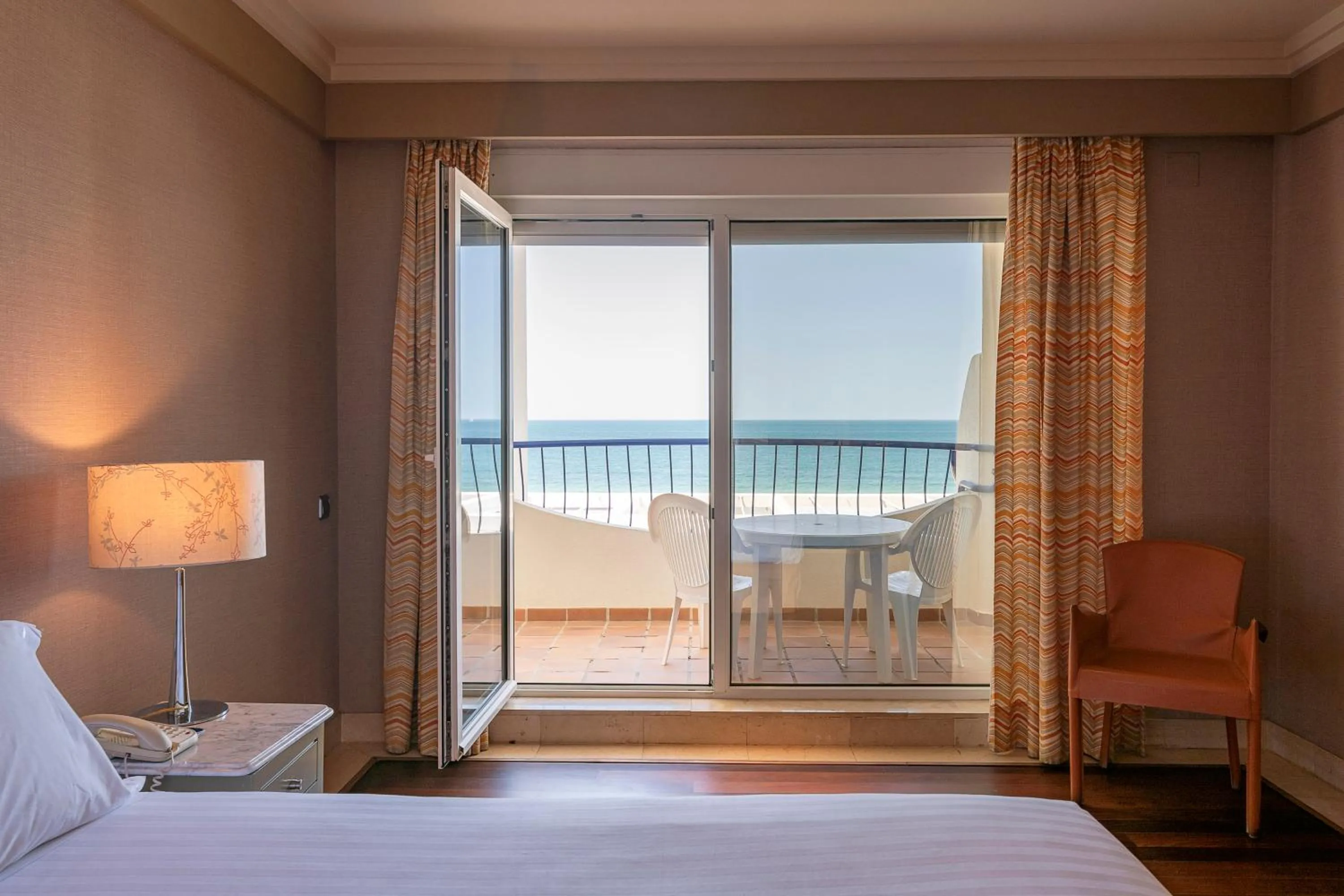 Balcony/Terrace, Bed in Hotel Playa Victoria