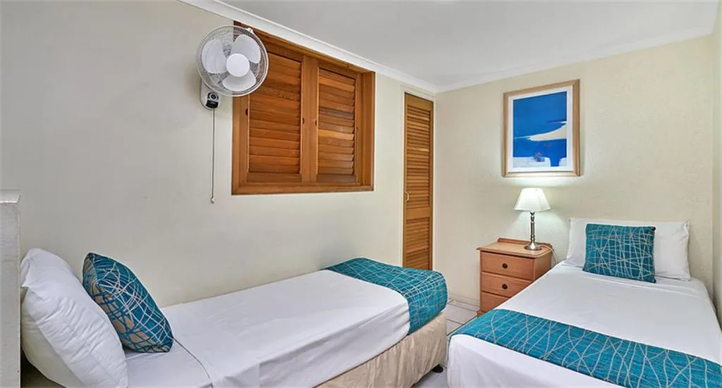 Bed in Trinity Beach Club Holiday Apartments