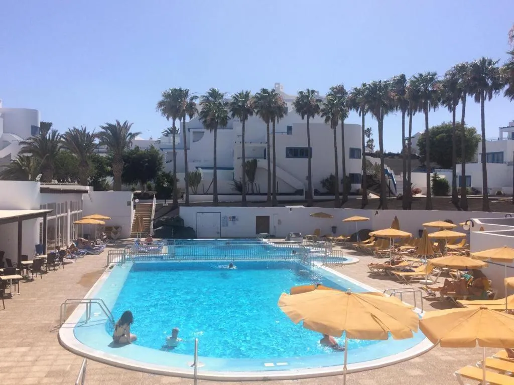Swimming pool in Apartamentos Club Pocillos