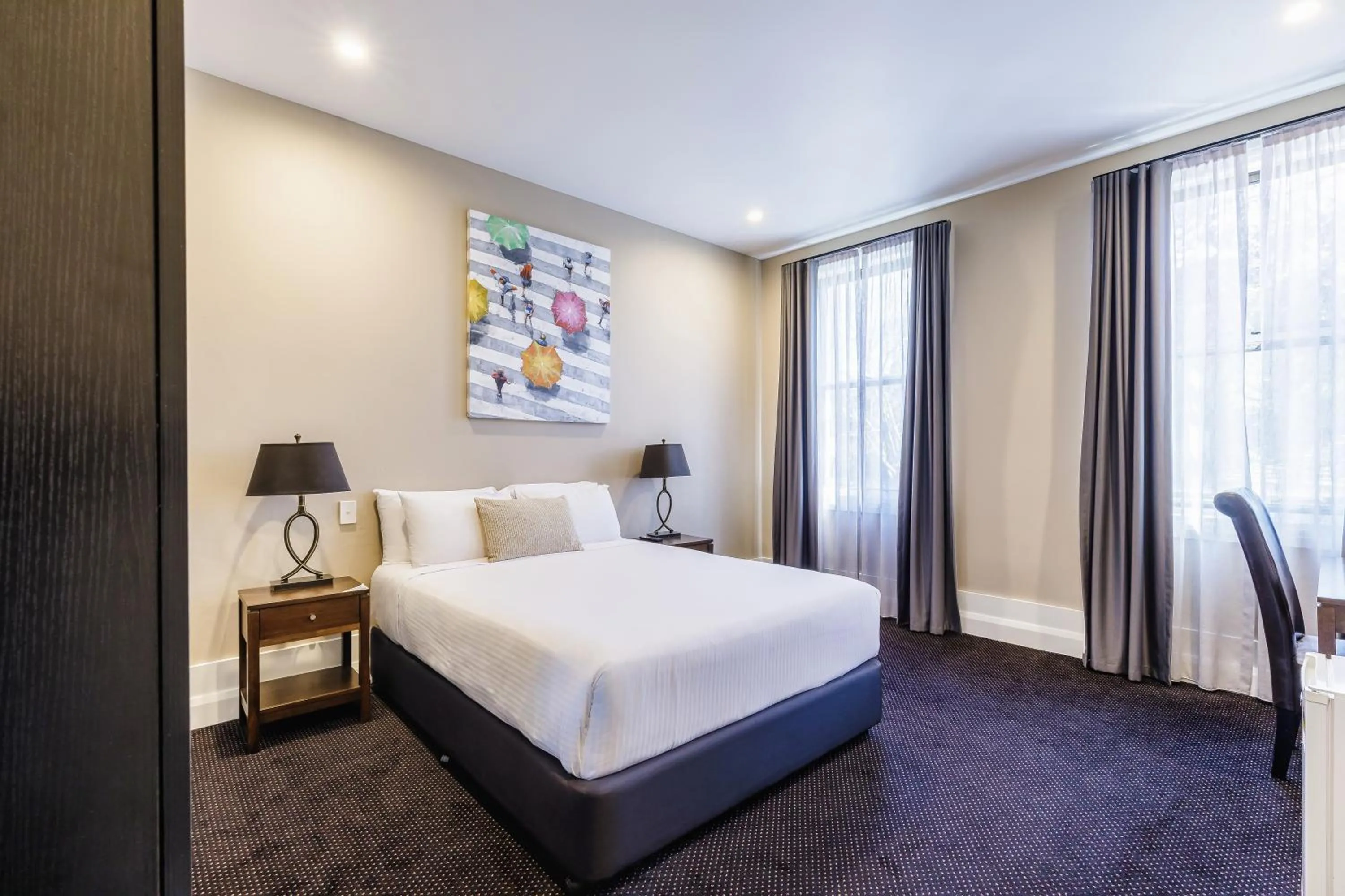 Bed in Royal Exhibition Hotel