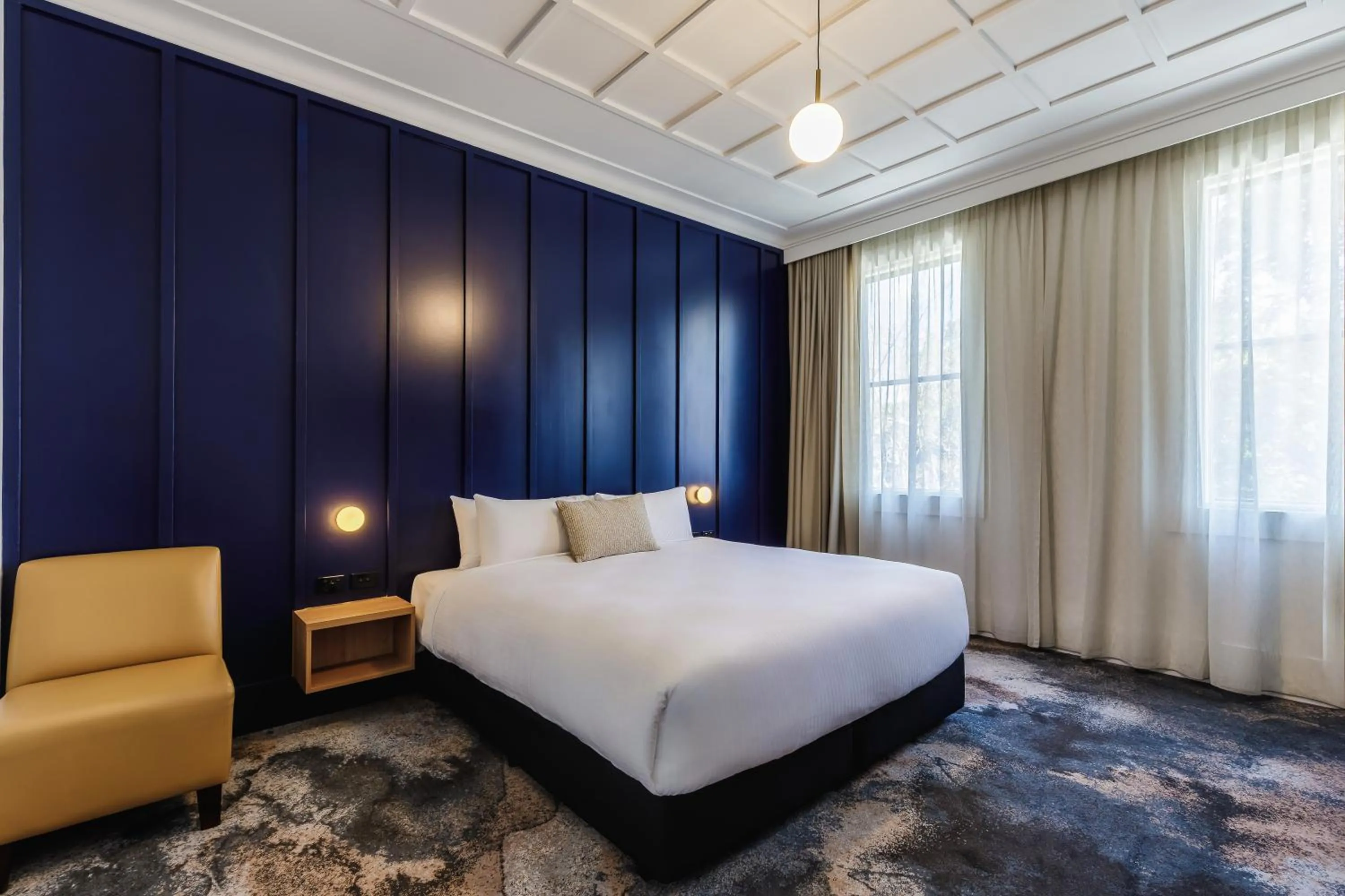 Bed in Royal Exhibition Hotel